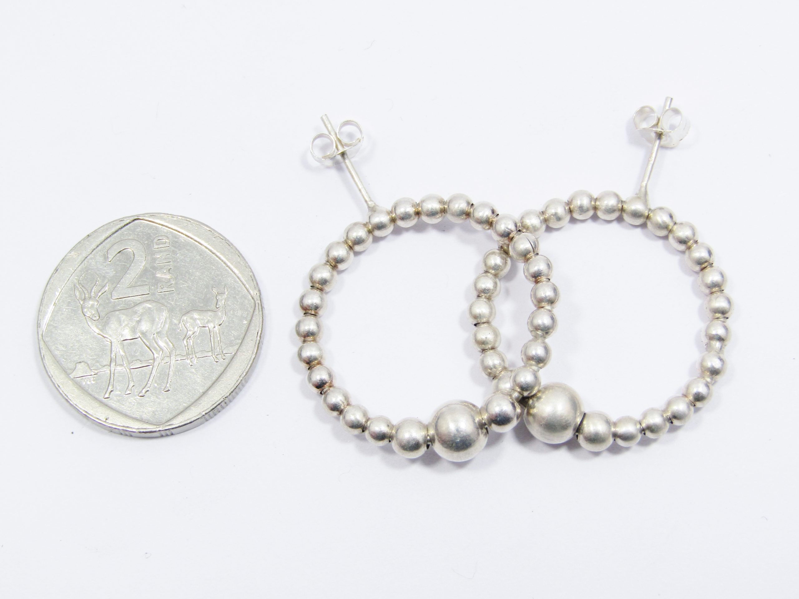 A Gorgeous Pair of Circle Ball Earrings in Sterling Silver.