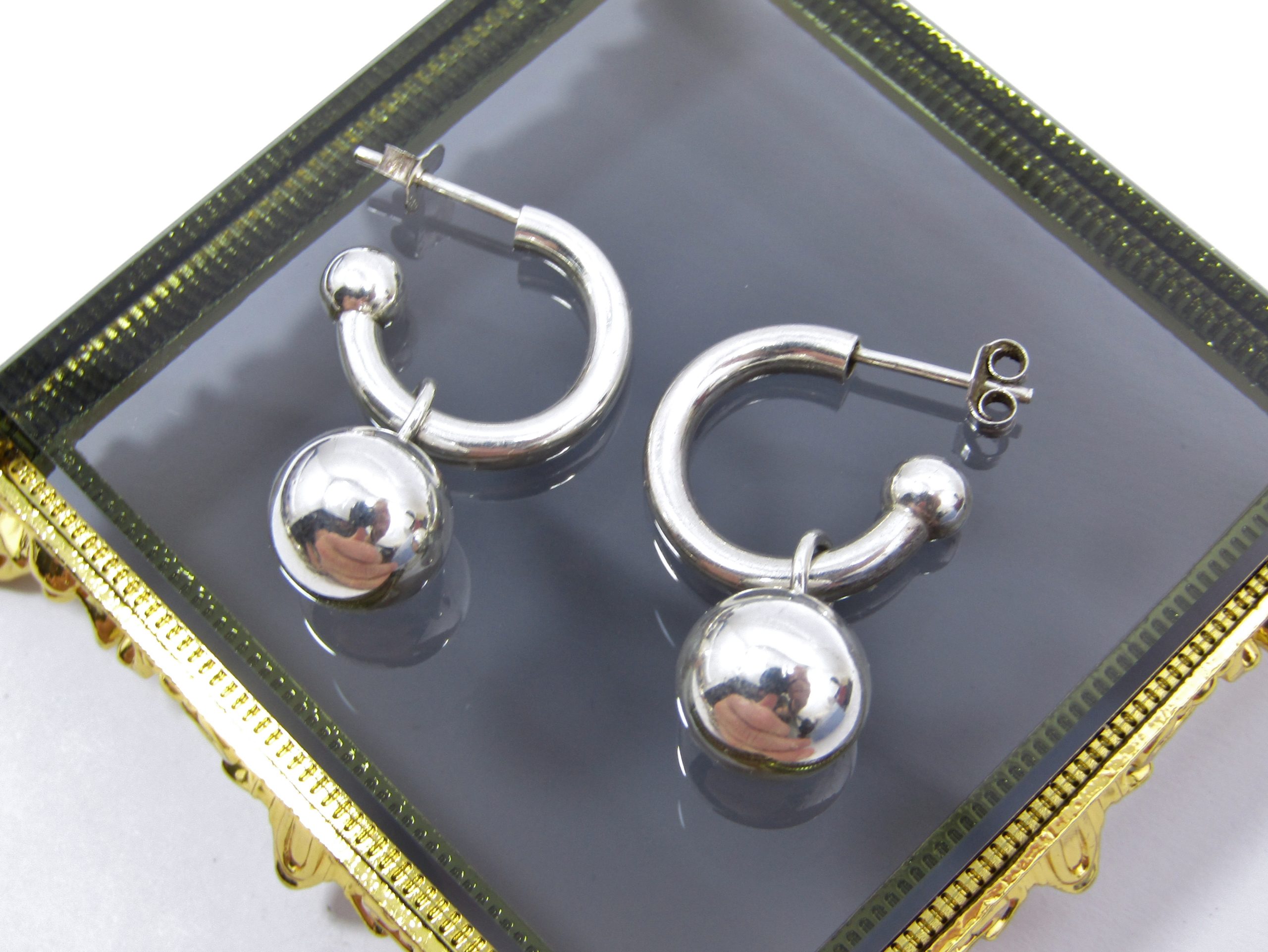 A Stunning Pair of Pretty Woman Earrings in Sterling Silver