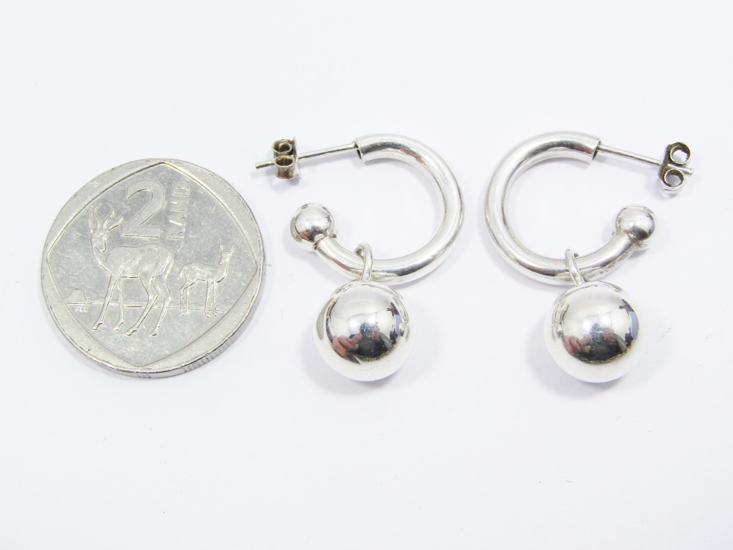 A Stunning Pair of Pretty Woman Earrings in Sterling Silver