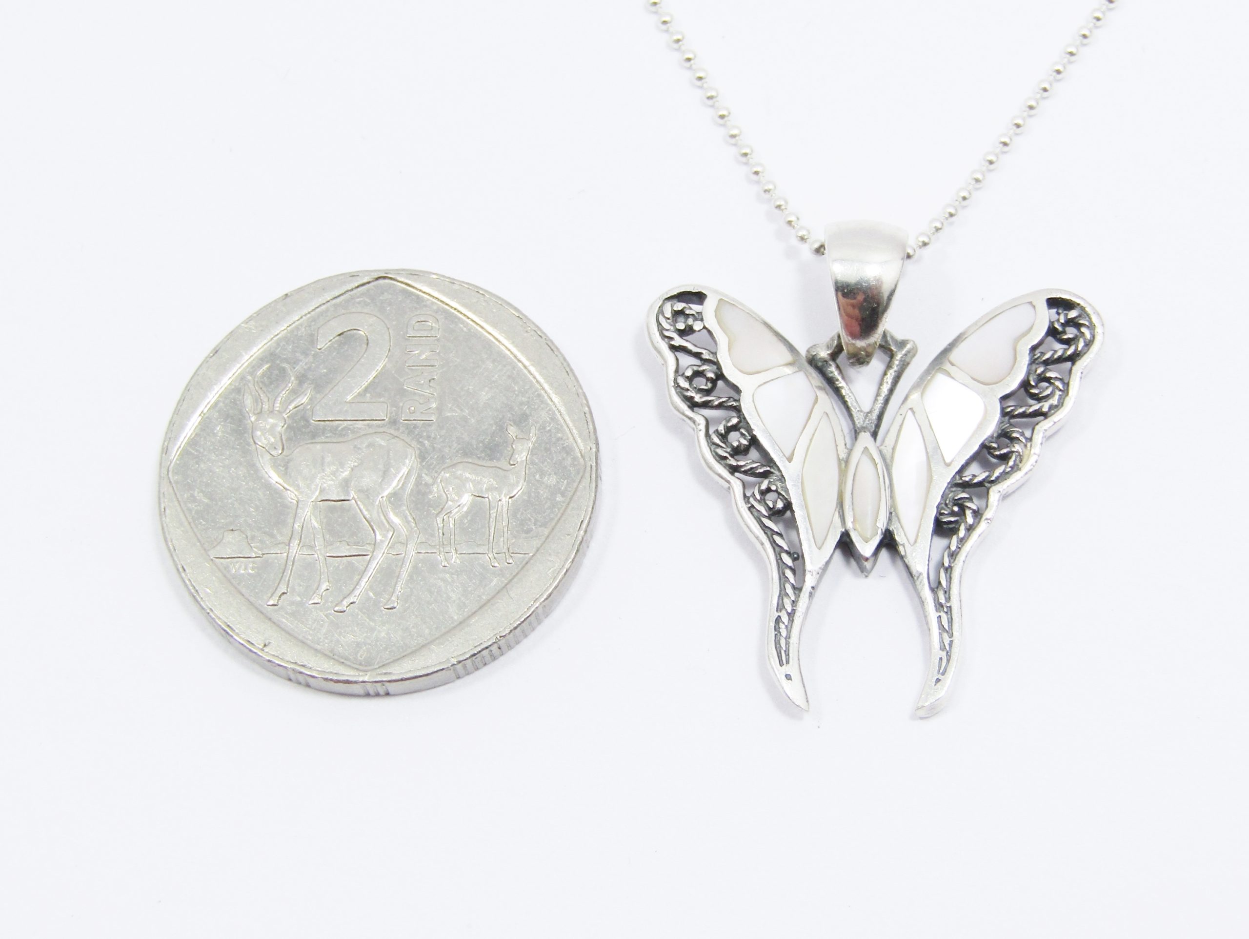 A Stunning Mother of Pearl Inlay Butterfly Necklace on Chain in Sterling Silver.