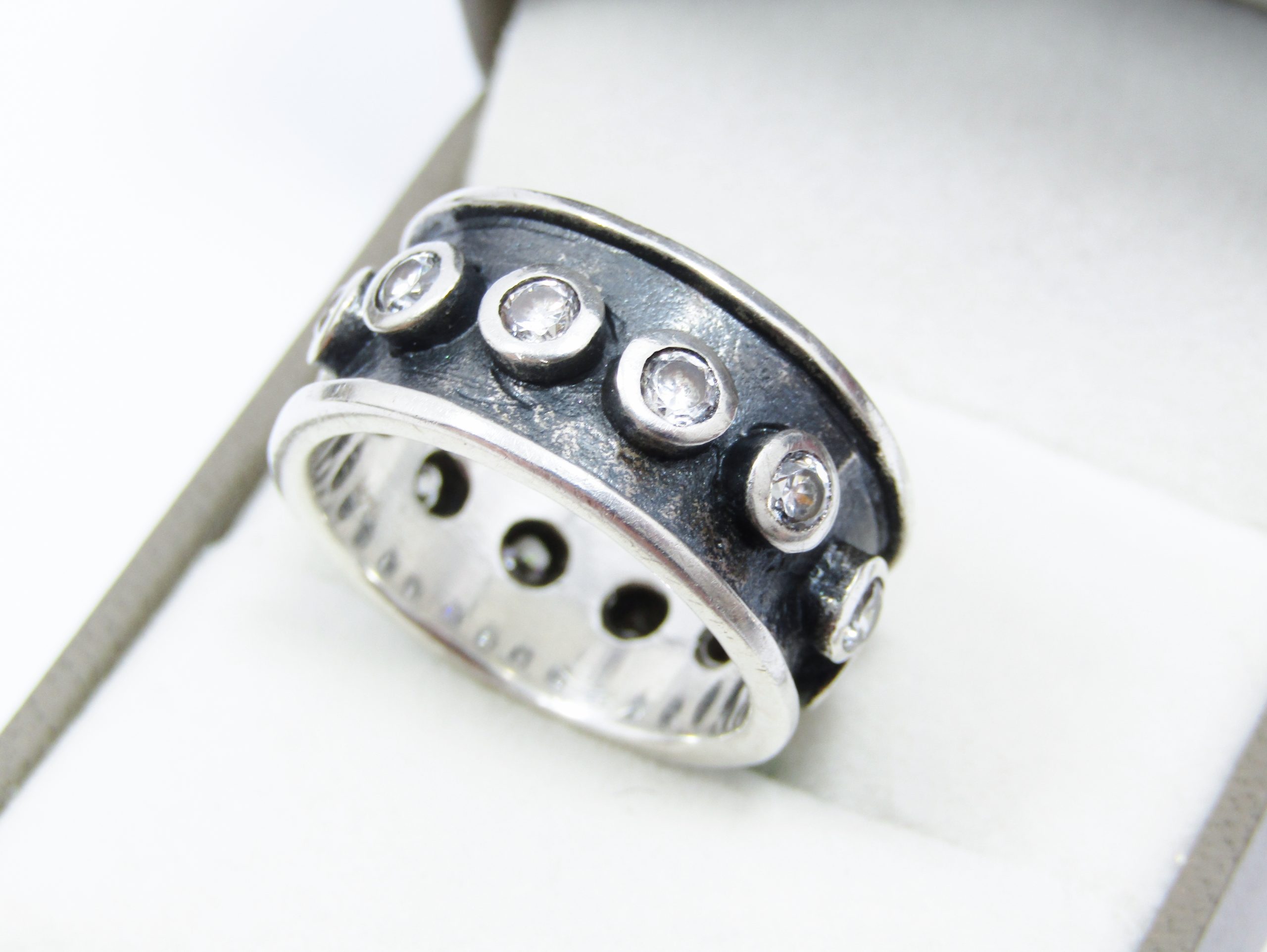 A Chunky Oxidized Full Eternity Zirconia Band in Sterling Silver