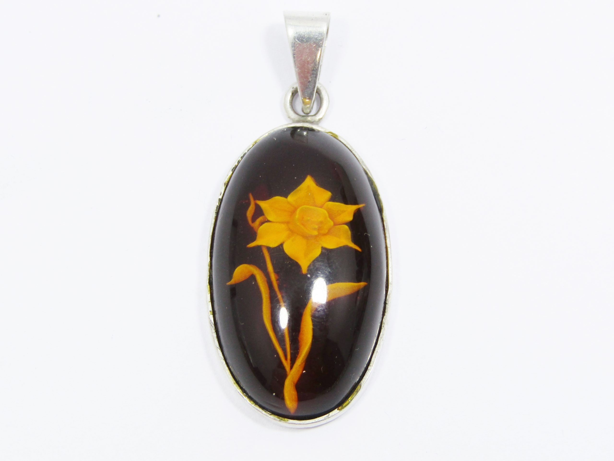 A Stunning Oval Resin Flower Pendant in Sterling Silver