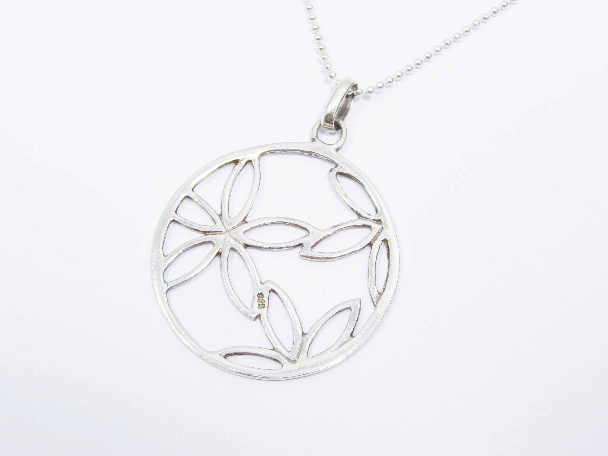 A Stunning Round cut out flower Pendant on chain in Sterling Silver.