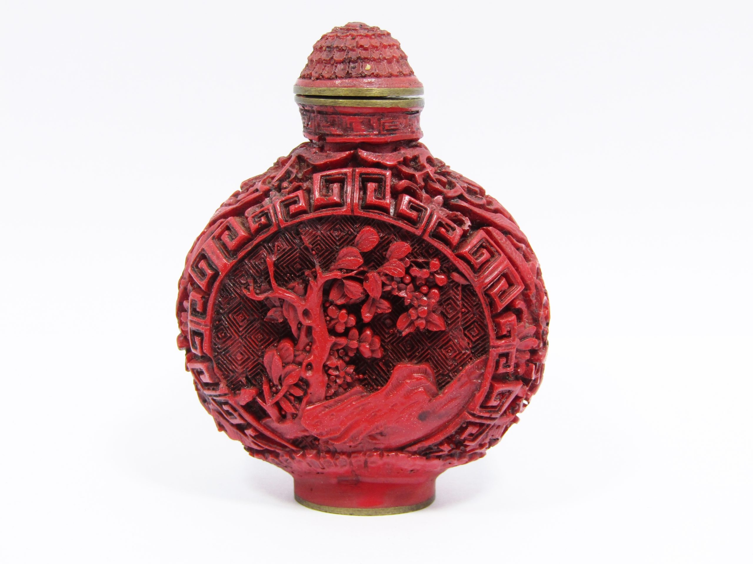 A Beautiful craved Cinnabar Chinese Snuff Bottle