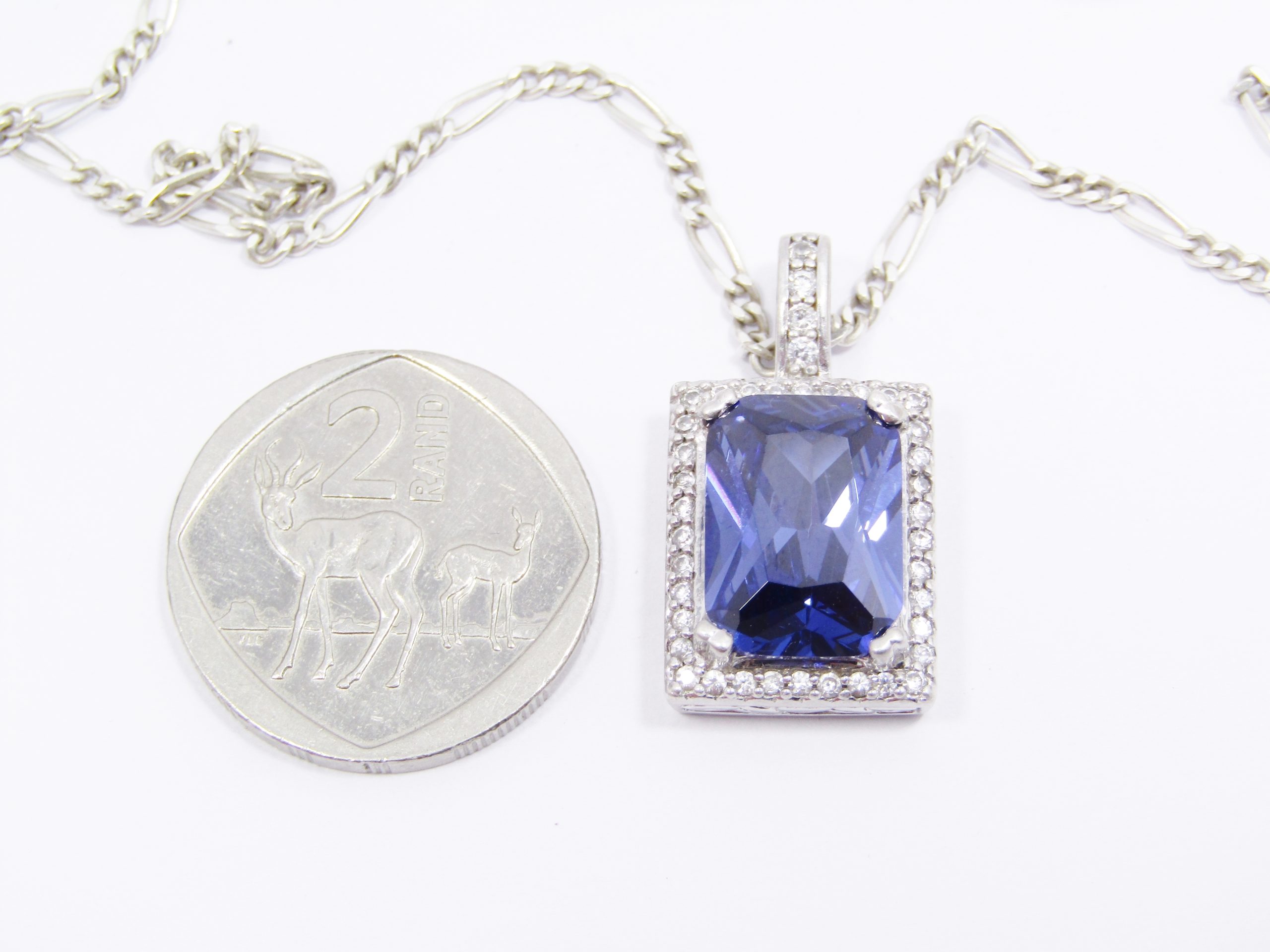 A Lovely Royal Blue Zirconia Pendant on Chain in Sterling Silver.