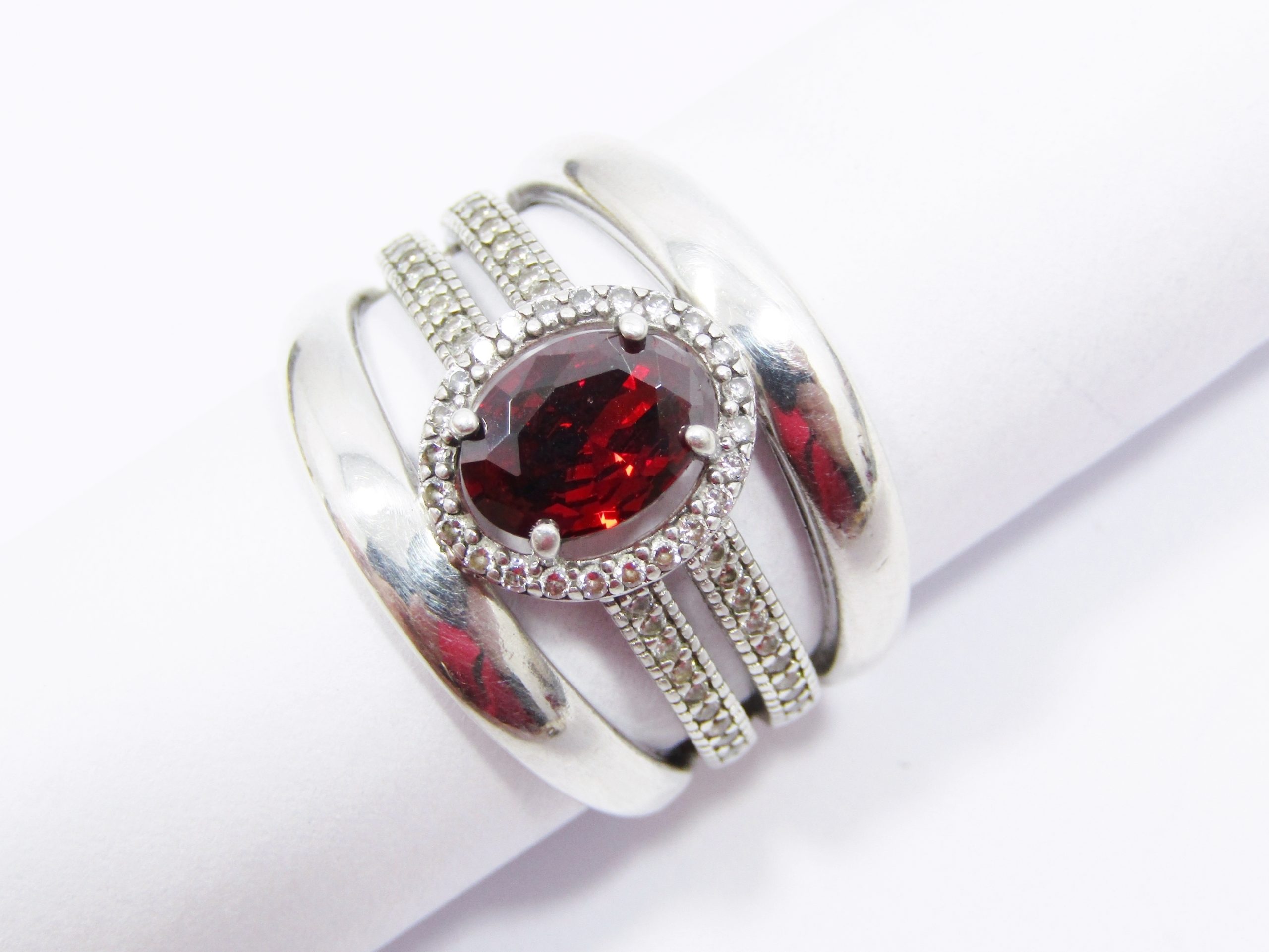 A Stunning Four Band into one Red Stone Ring with tiny Zirconia's for Sparkle in Sterling Silver