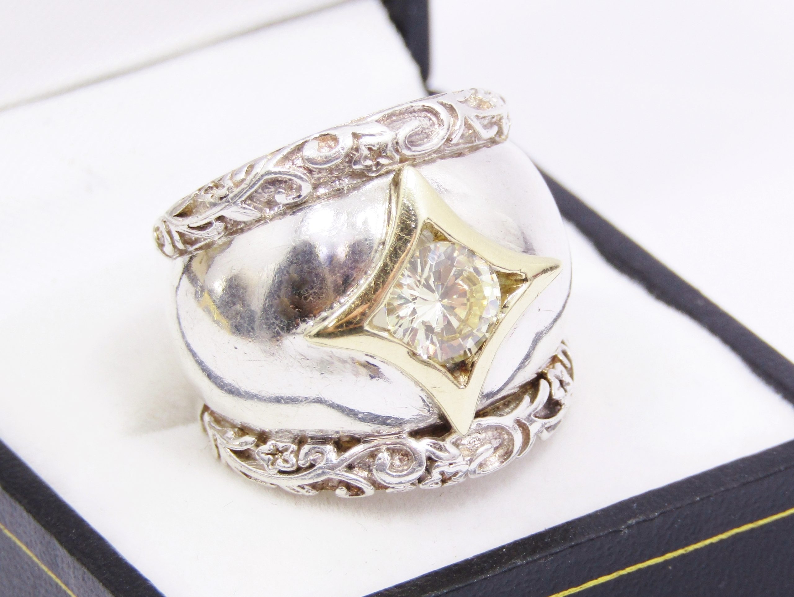 A Gorgeous Chunky Ring set in Sterling Silver and 9ct Gold