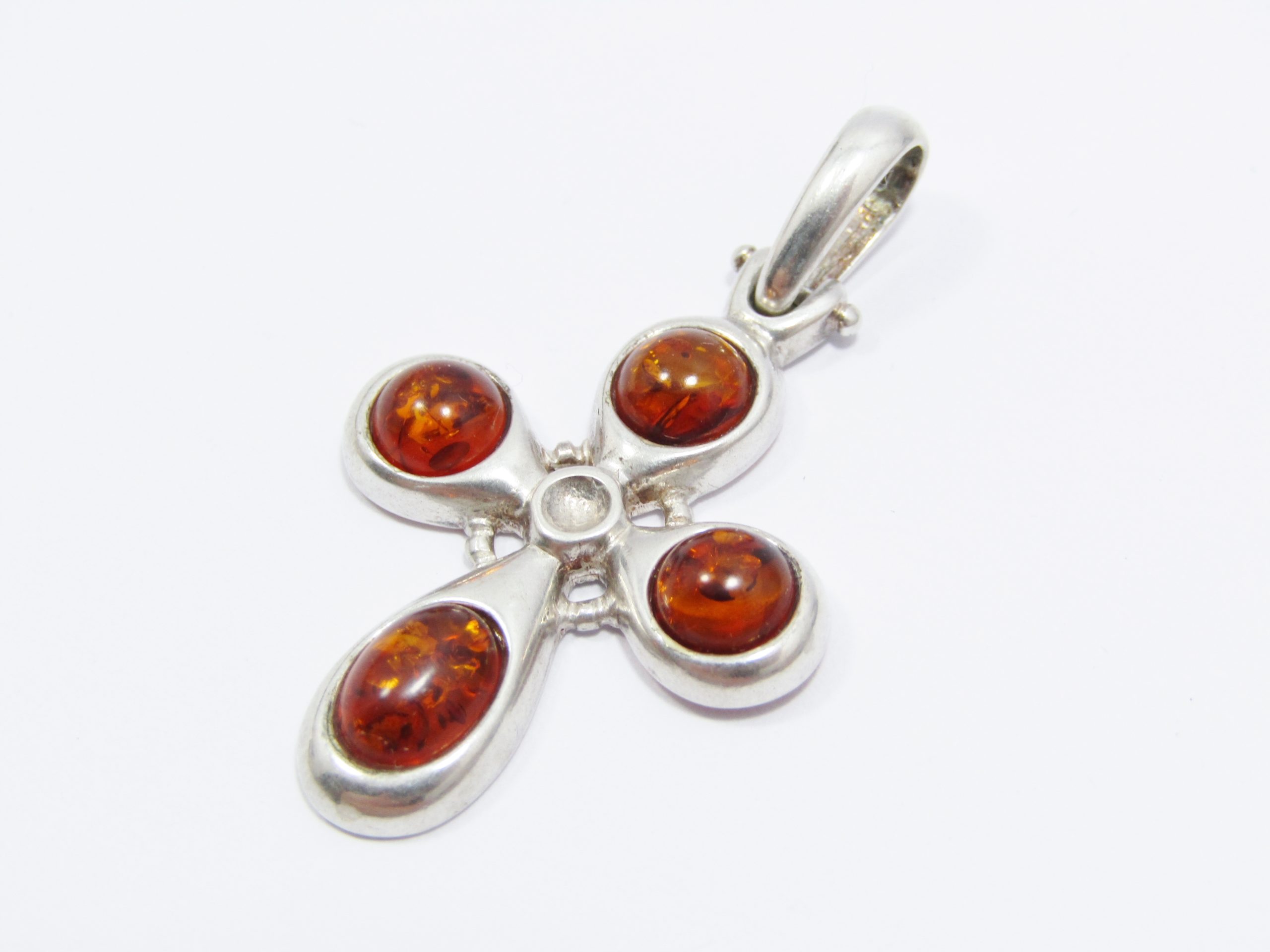 A Beautiful Amber Cross Pendant in Sterling Silver