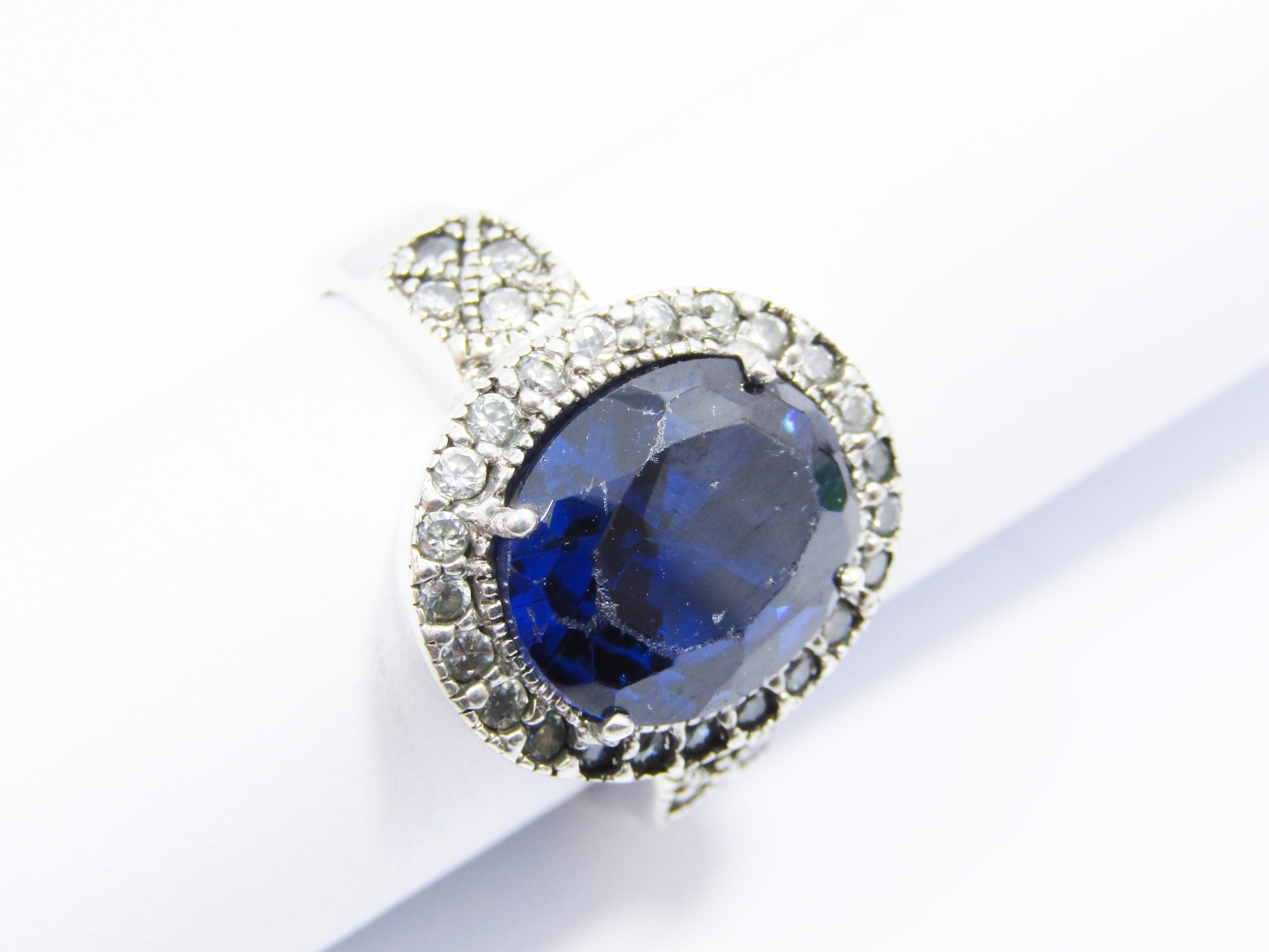 A Gorgeous Chunky Royal Blue Halo Design Zirconia Ring in Sterling Silver