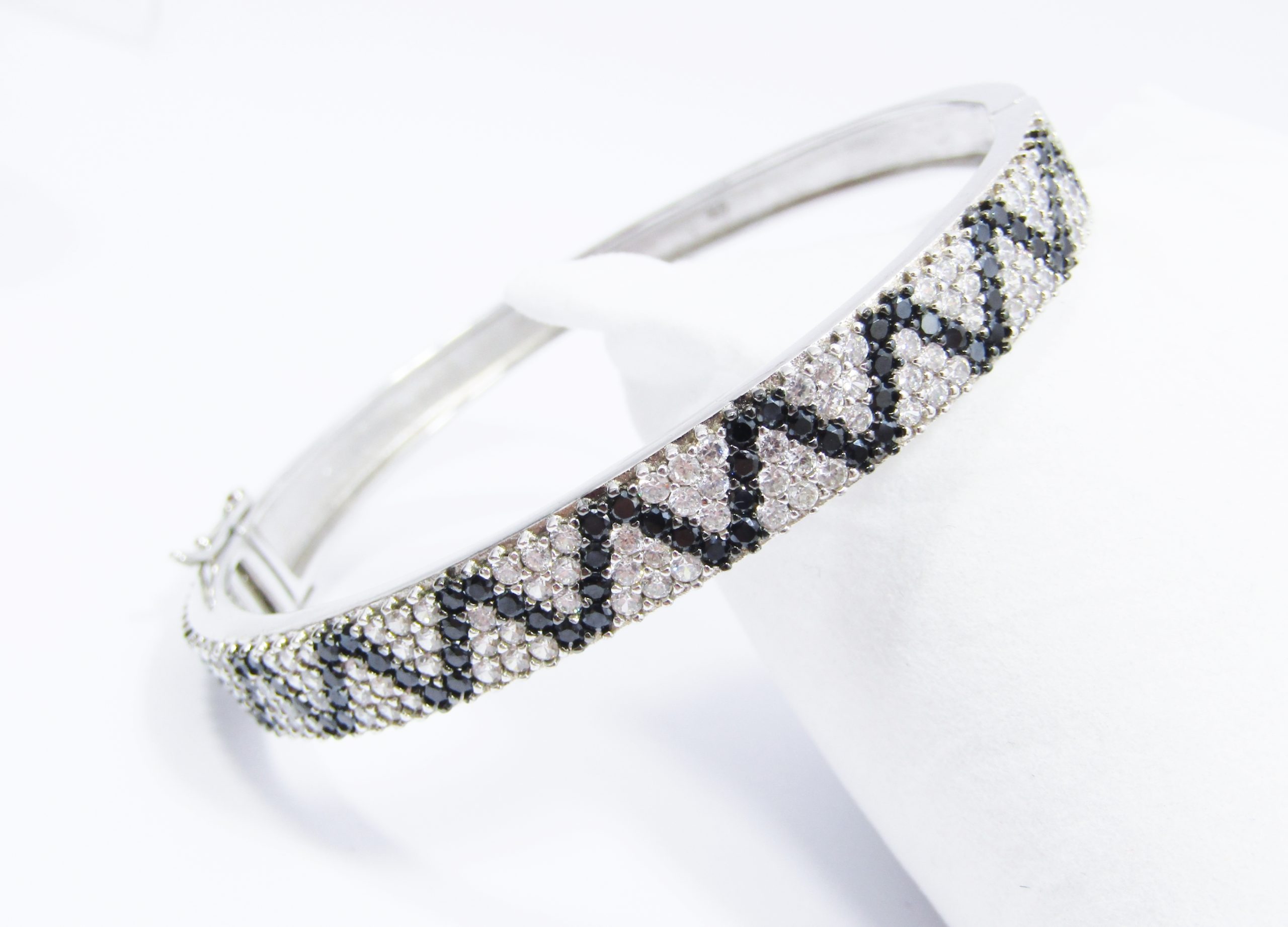 A Gorgeous Pave Set Cuff Bangle in Black and Clear Zirconia's in Sterling Silver