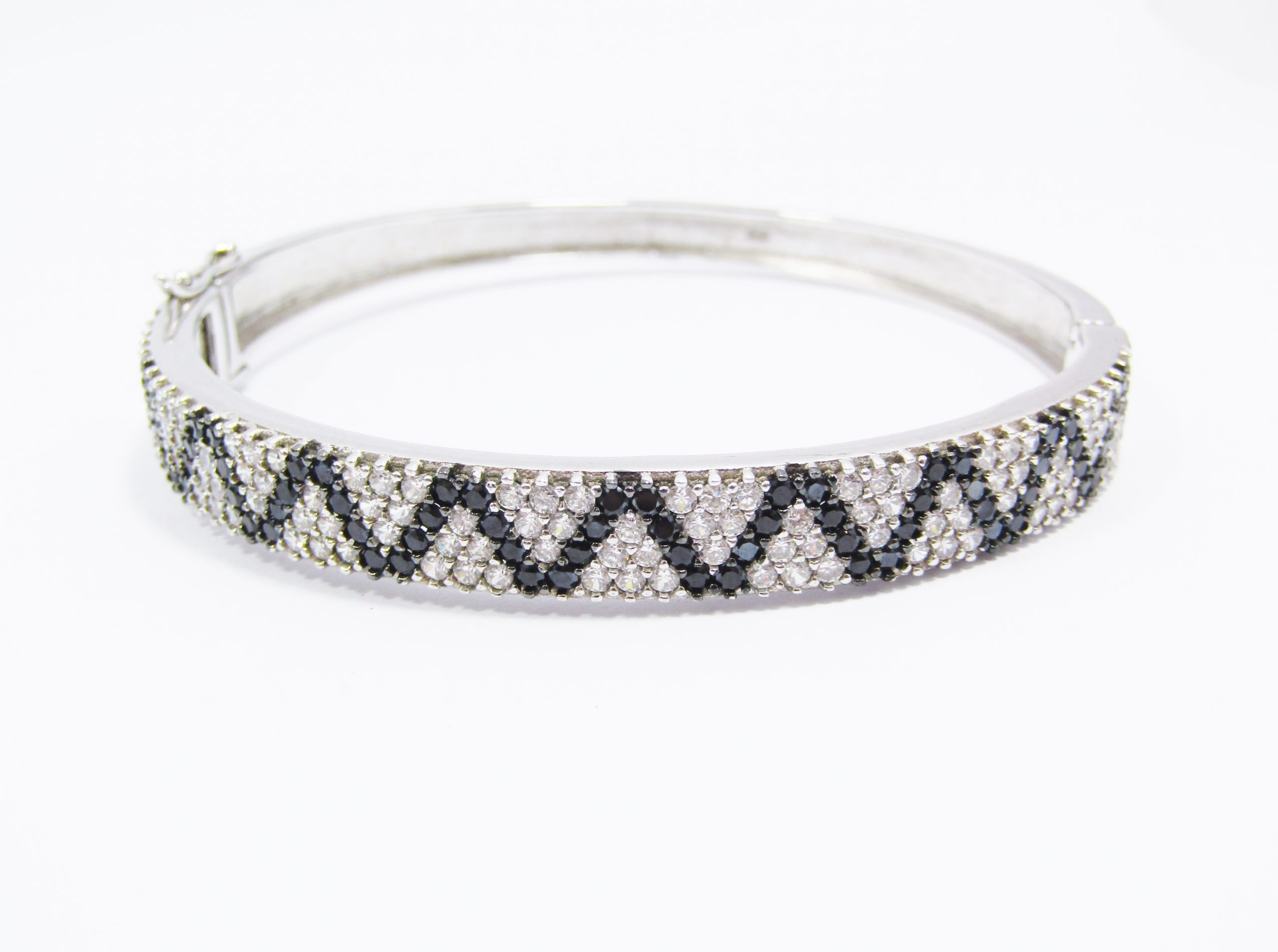 A Gorgeous Pave Set Cuff Bangle in Black and Clear Zirconia's in Sterling Silver