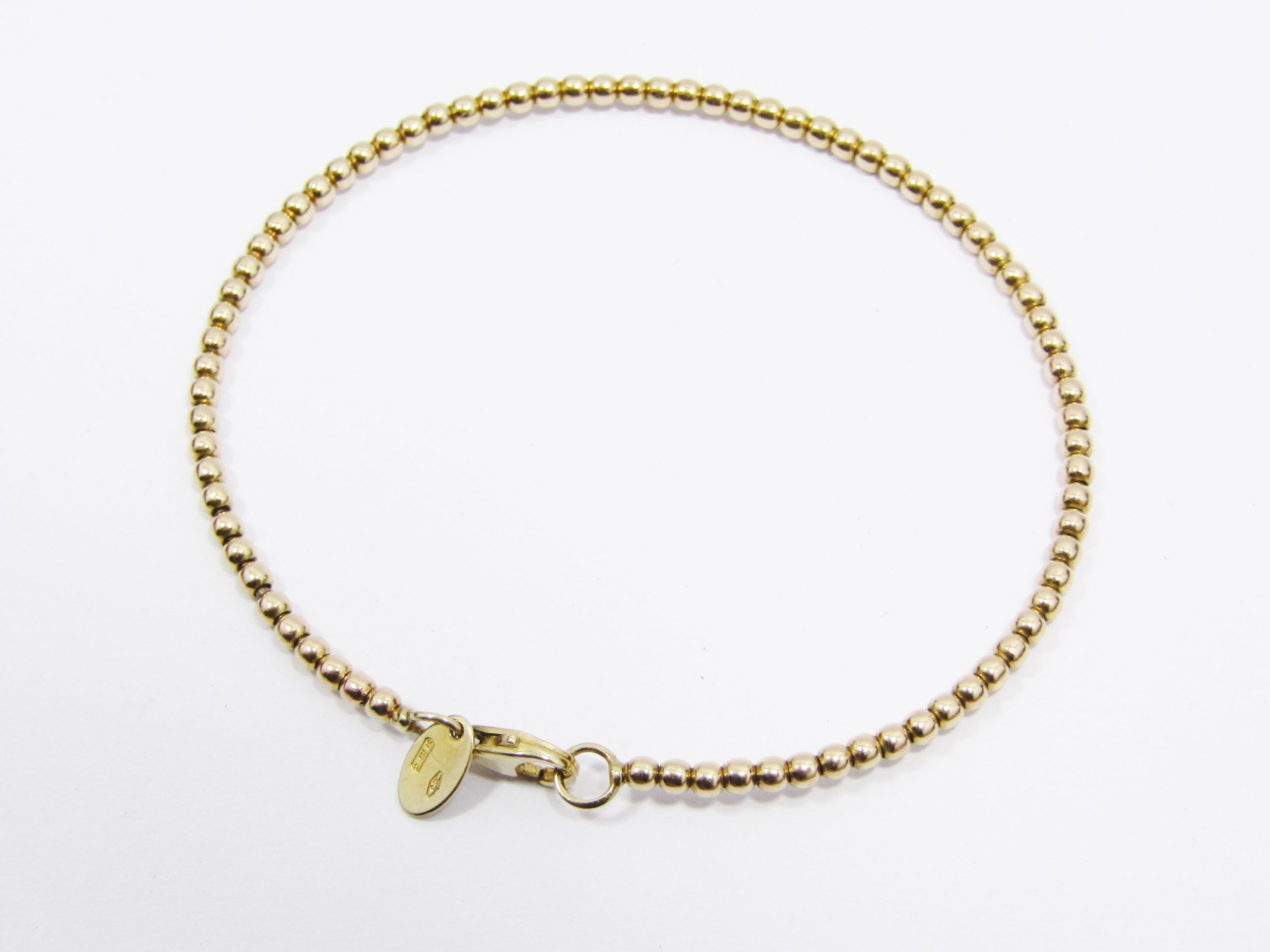 A Gorgeous Ball Stack Bangle in 9ct Gold With Italian hallmarks