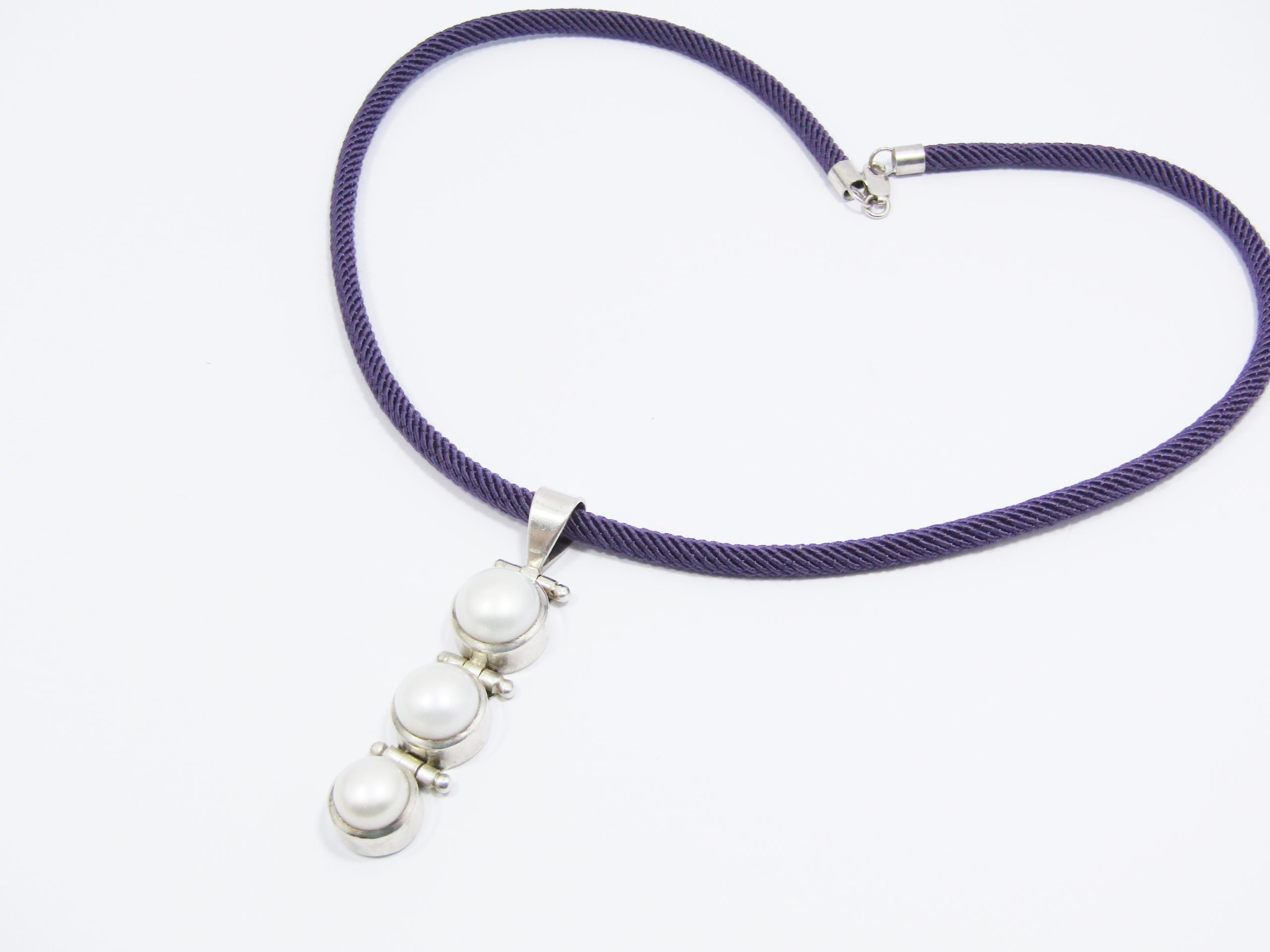A Stunning Fresh Water Pearl Necklace on a Silk Rope Necklace in Sterling Silver