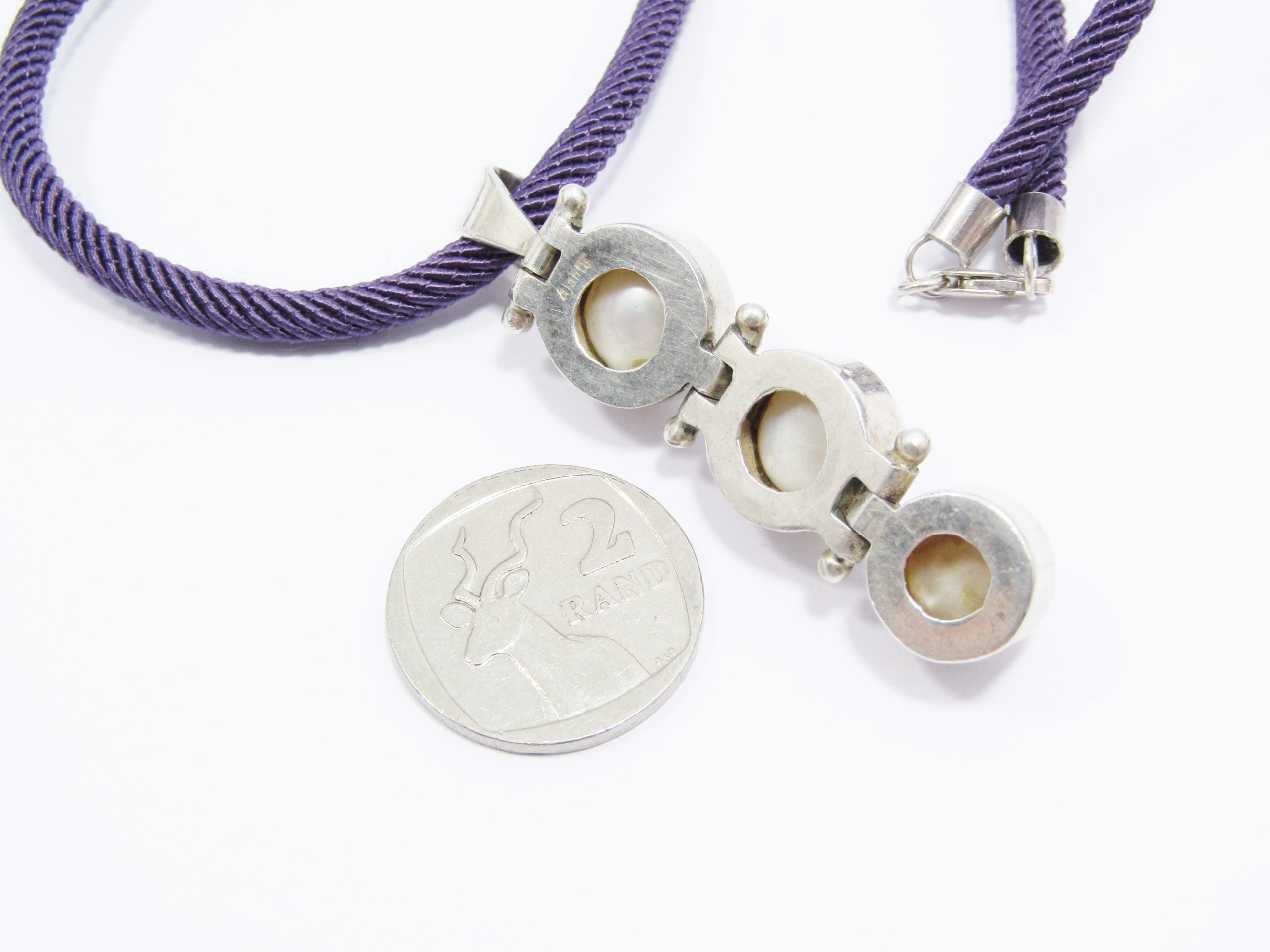 A Stunning Fresh Water Pearl Necklace on a Silk Rope Necklace in Sterling Silver