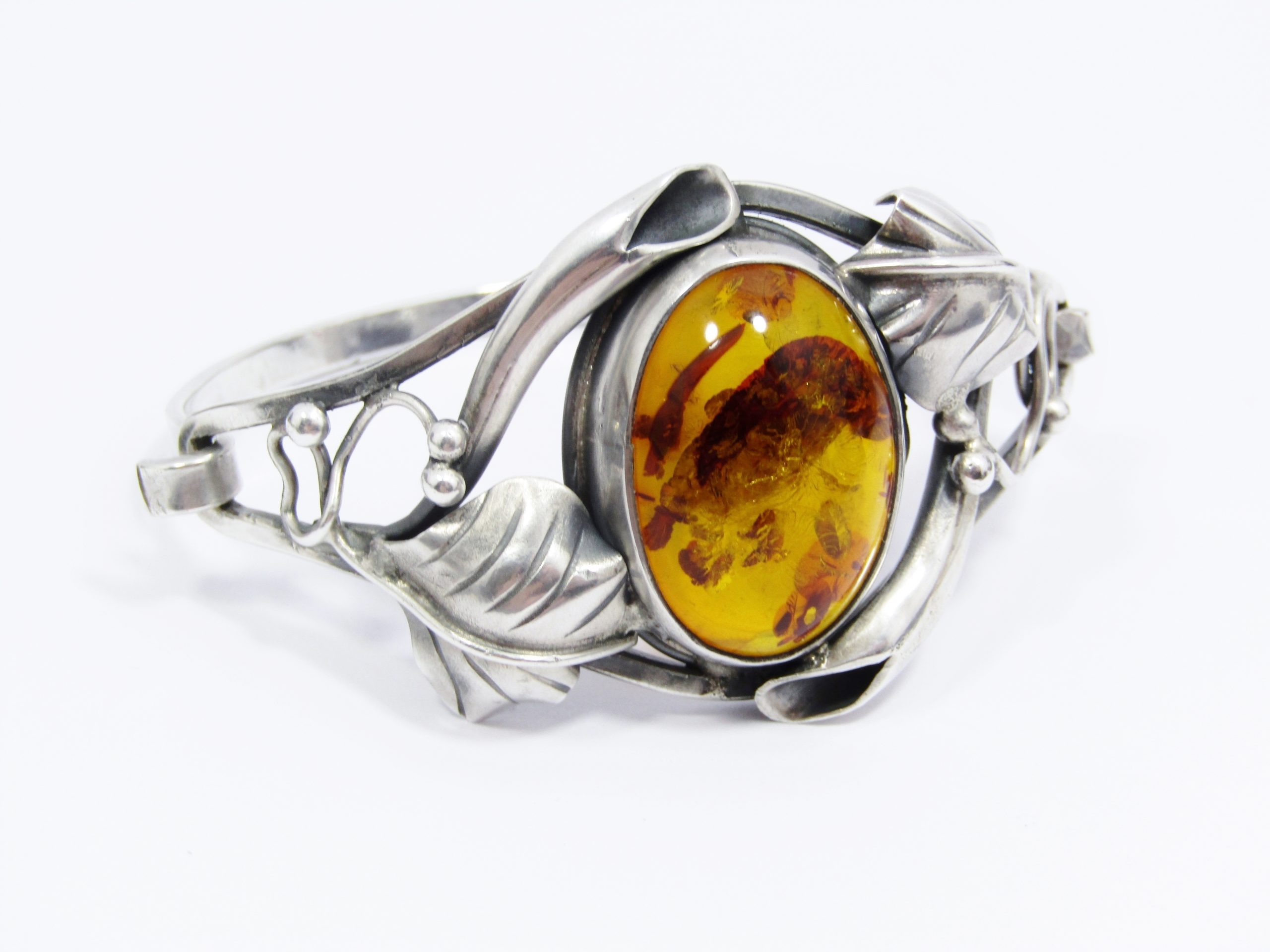 A Stunning Ornate Amber Hinged bangle in Sterling Silver