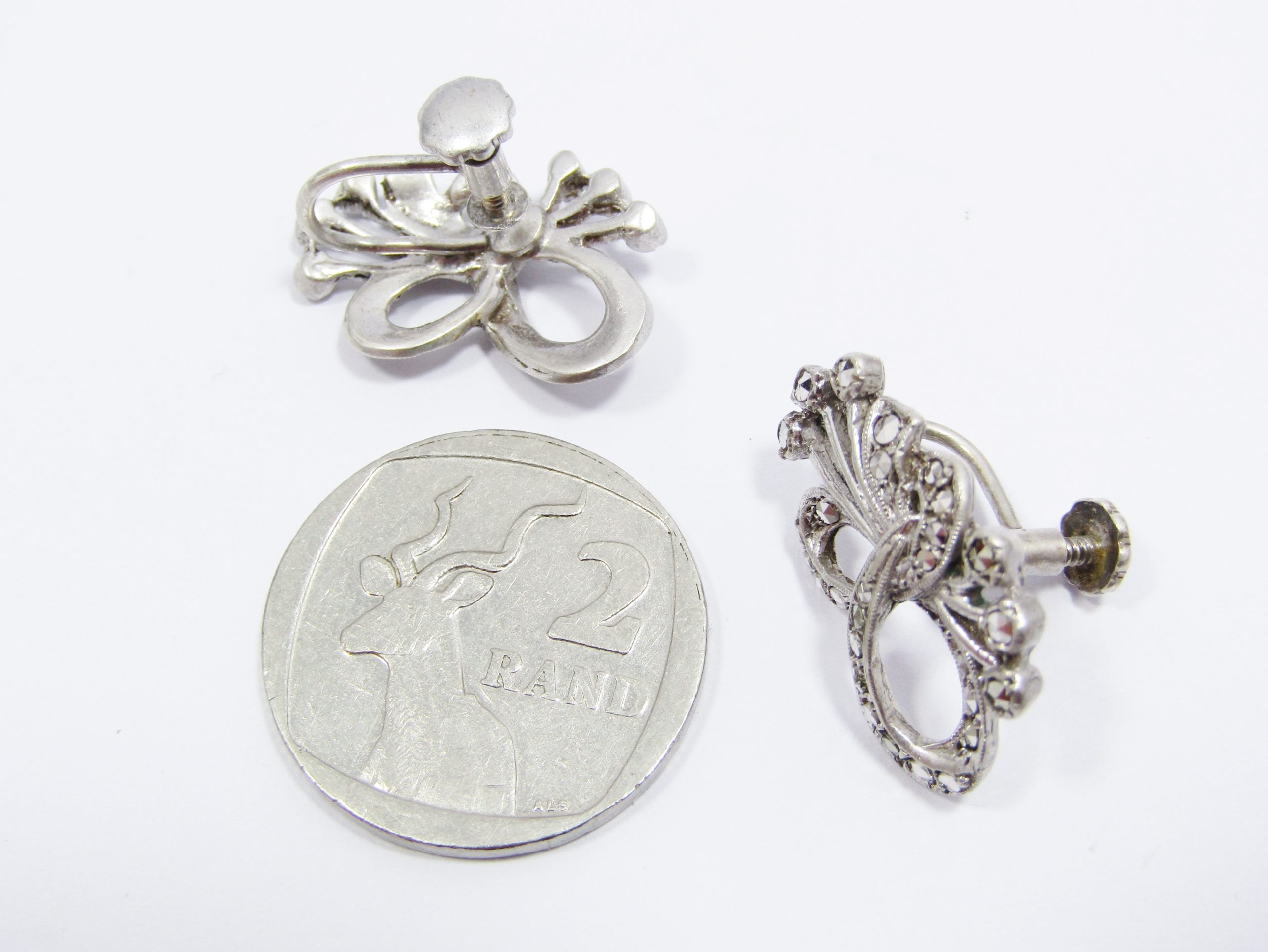 A Gorgeous Pair of Ribbon Design Screw Back Vintage Marcasite Earrings in Sterling Silver