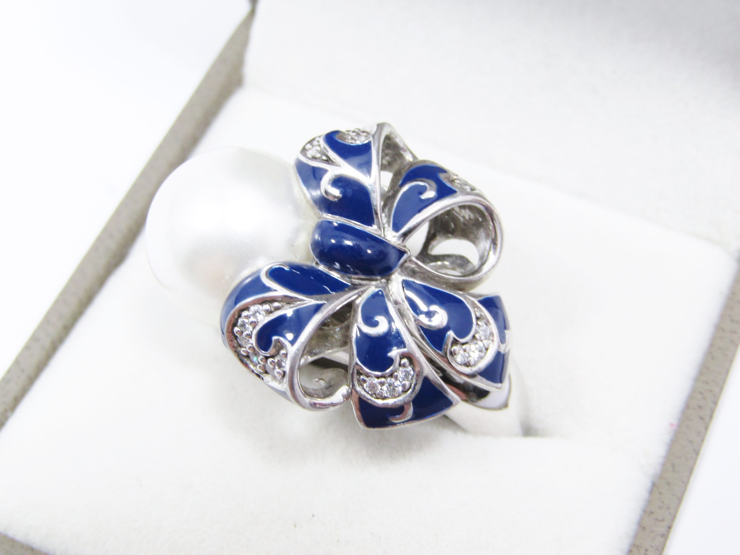 A Beautiful And oh So Different Belle Etoile Designer Ring With Blue Enameling and a Huge Glass Pearl Ring
