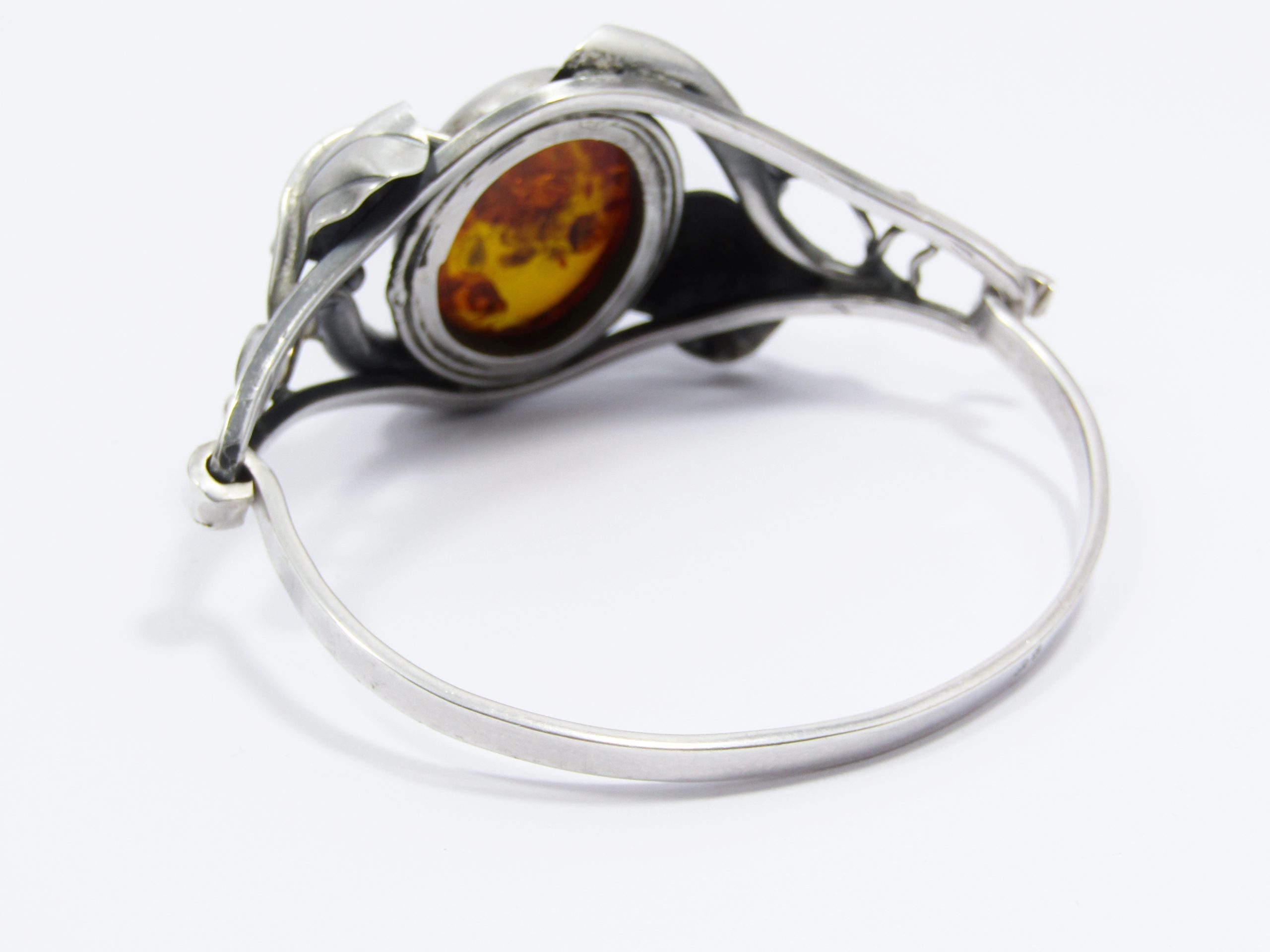 A Stunning Ornate Amber Hinged bangle in Sterling Silver