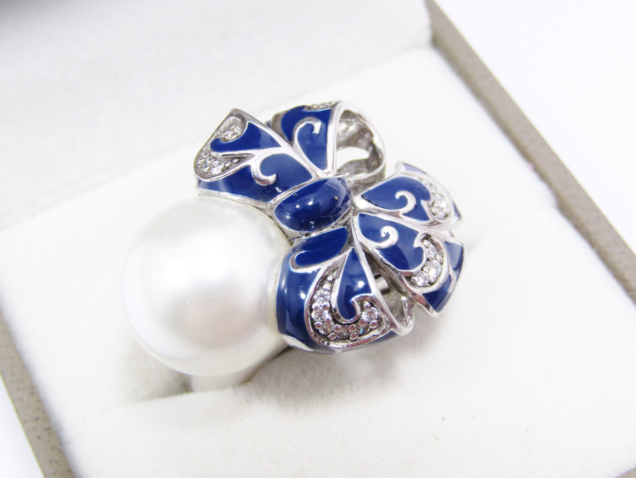 A Beautiful And oh So Different Belle Etoile Designer Ring With Blue Enameling and a Huge Glass Pearl Ring