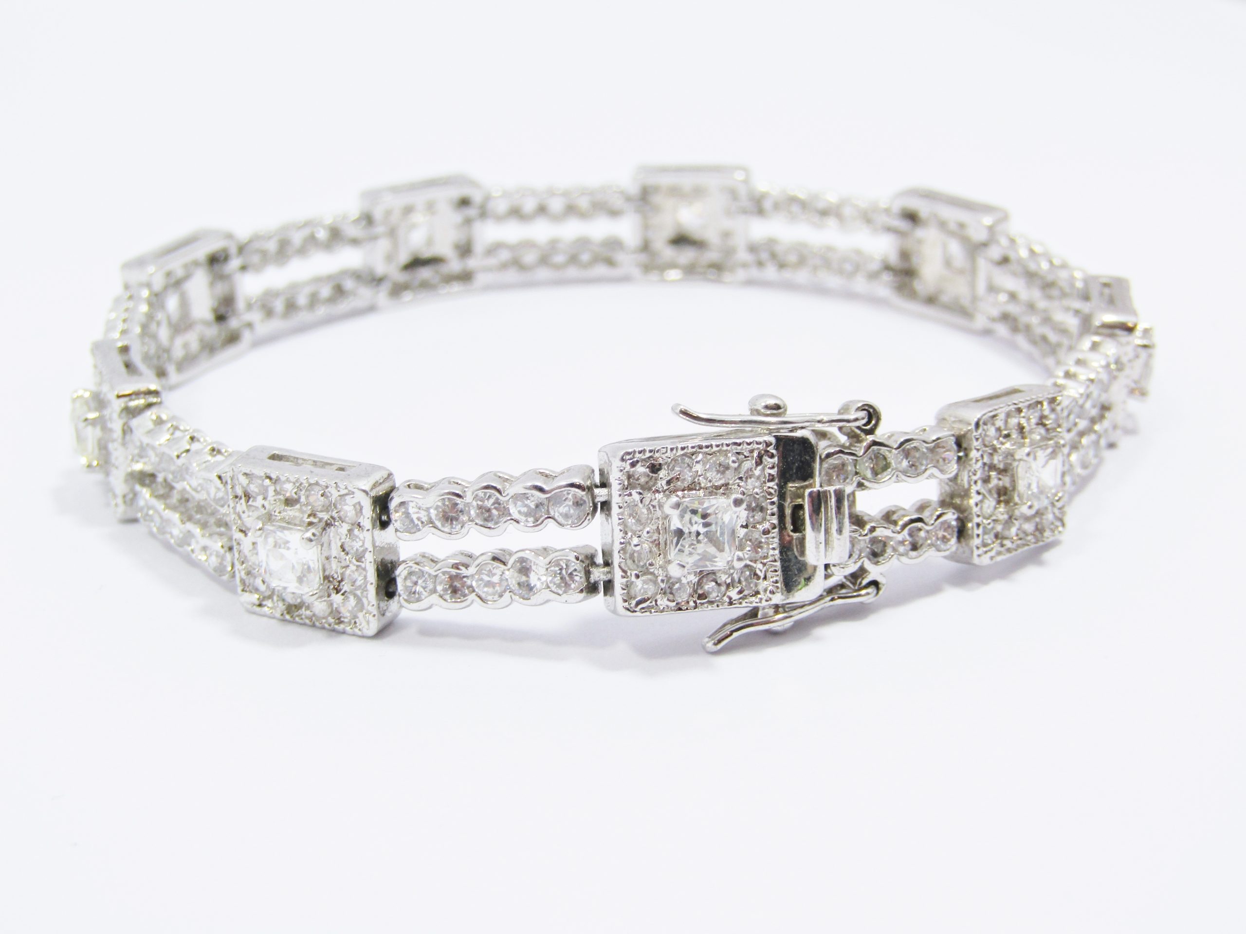 A Gorgeous Rhodium Plated Vintage Design Double Row Clear Zirconia Tennis Bracelet in a Silver Tone