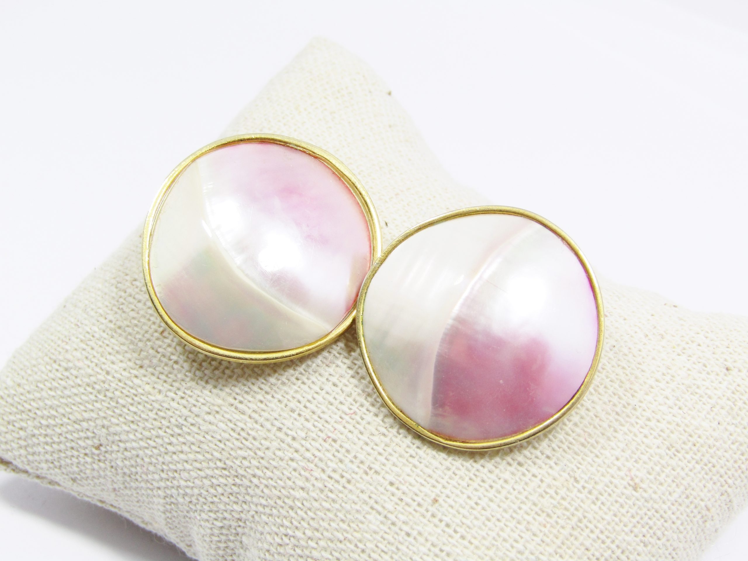 A Gorgeous Pair of Round Shell Stud Earrings in a Gold Tone