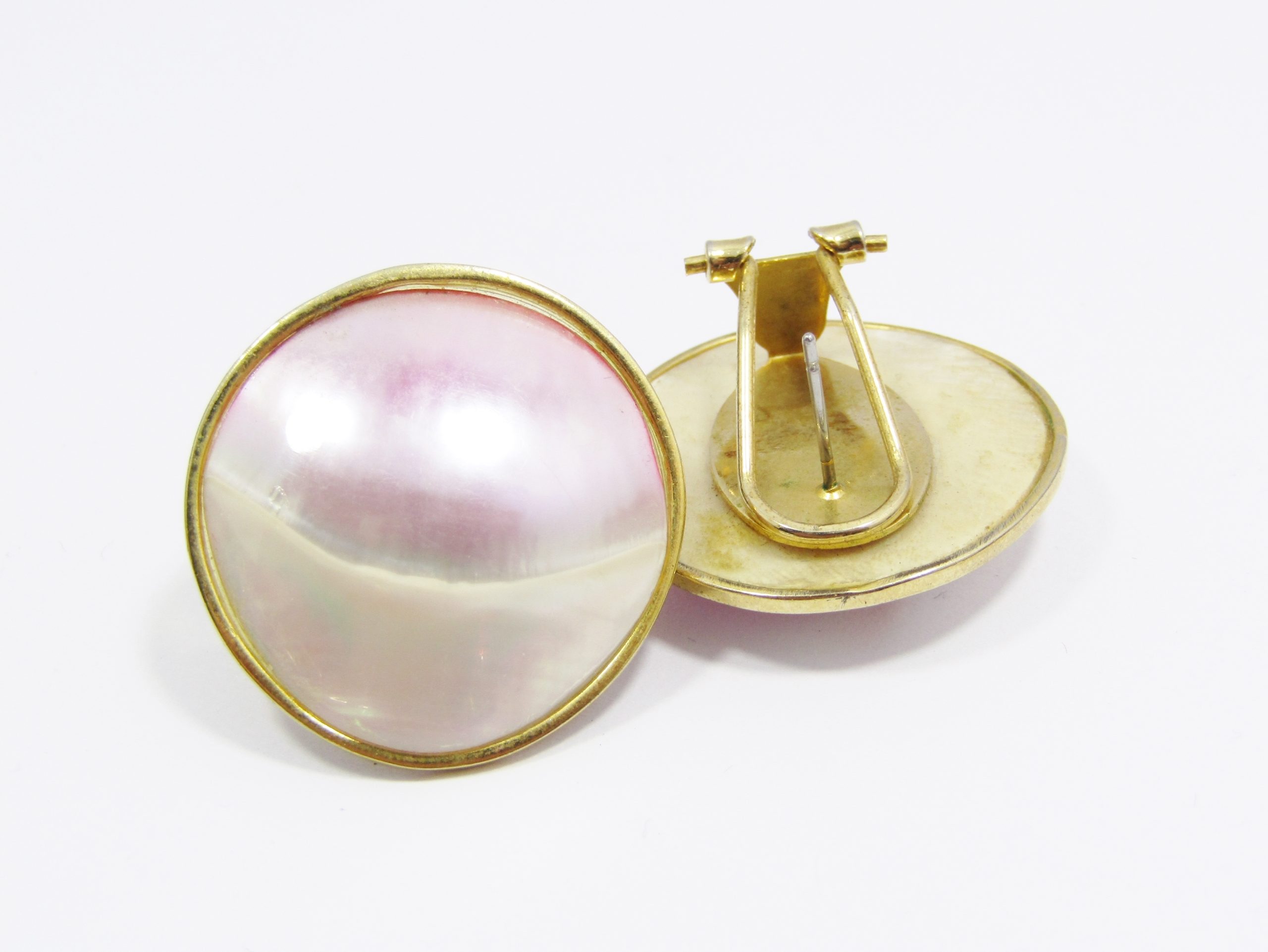 A Gorgeous Pair of Round Shell Stud Earrings in a Gold Tone