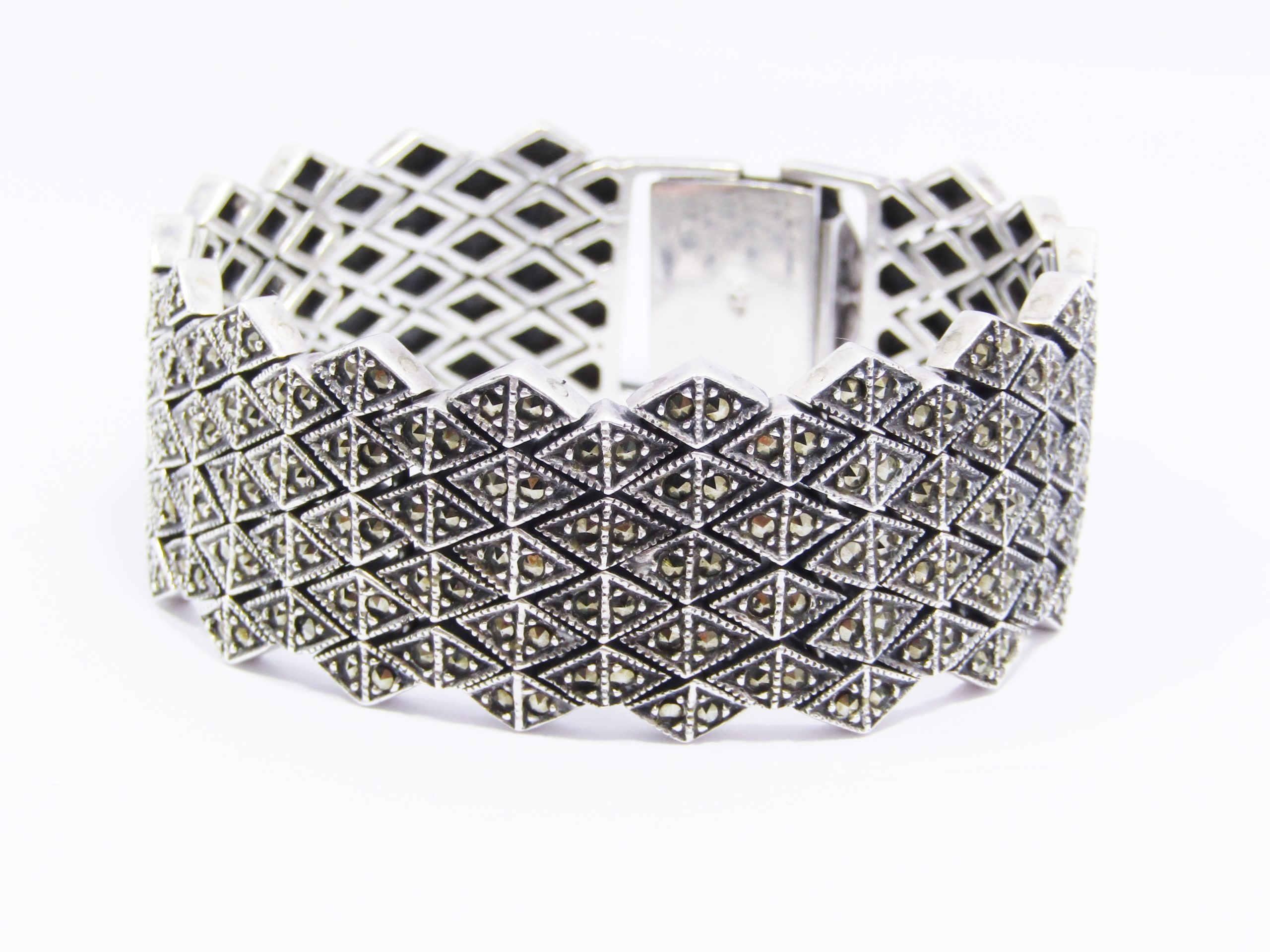 A Gorgeous Broad Articulated Marcasite Bracelet in Sterling Silver
