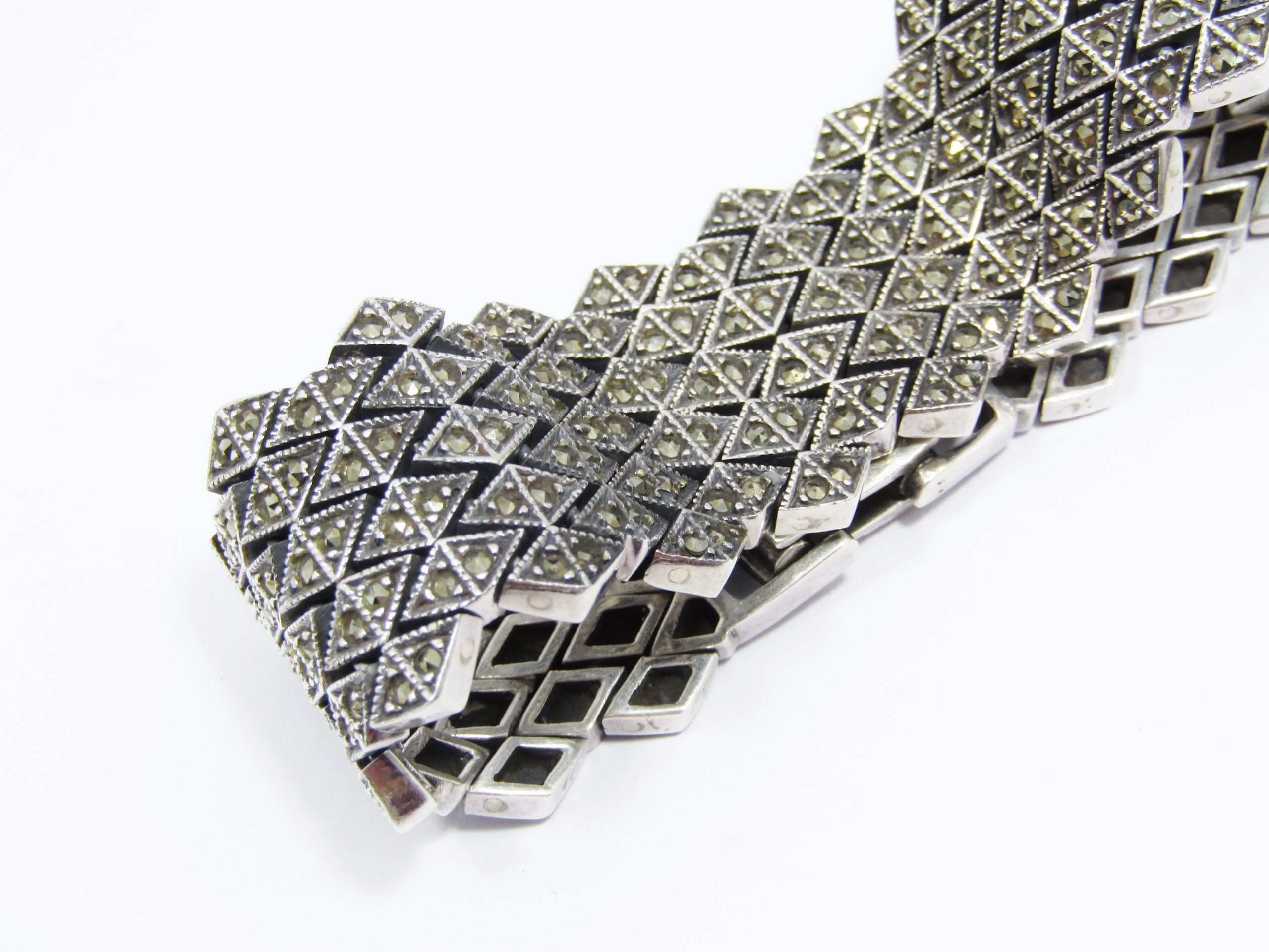 A Gorgeous Broad Articulated Marcasite Bracelet in Sterling Silver