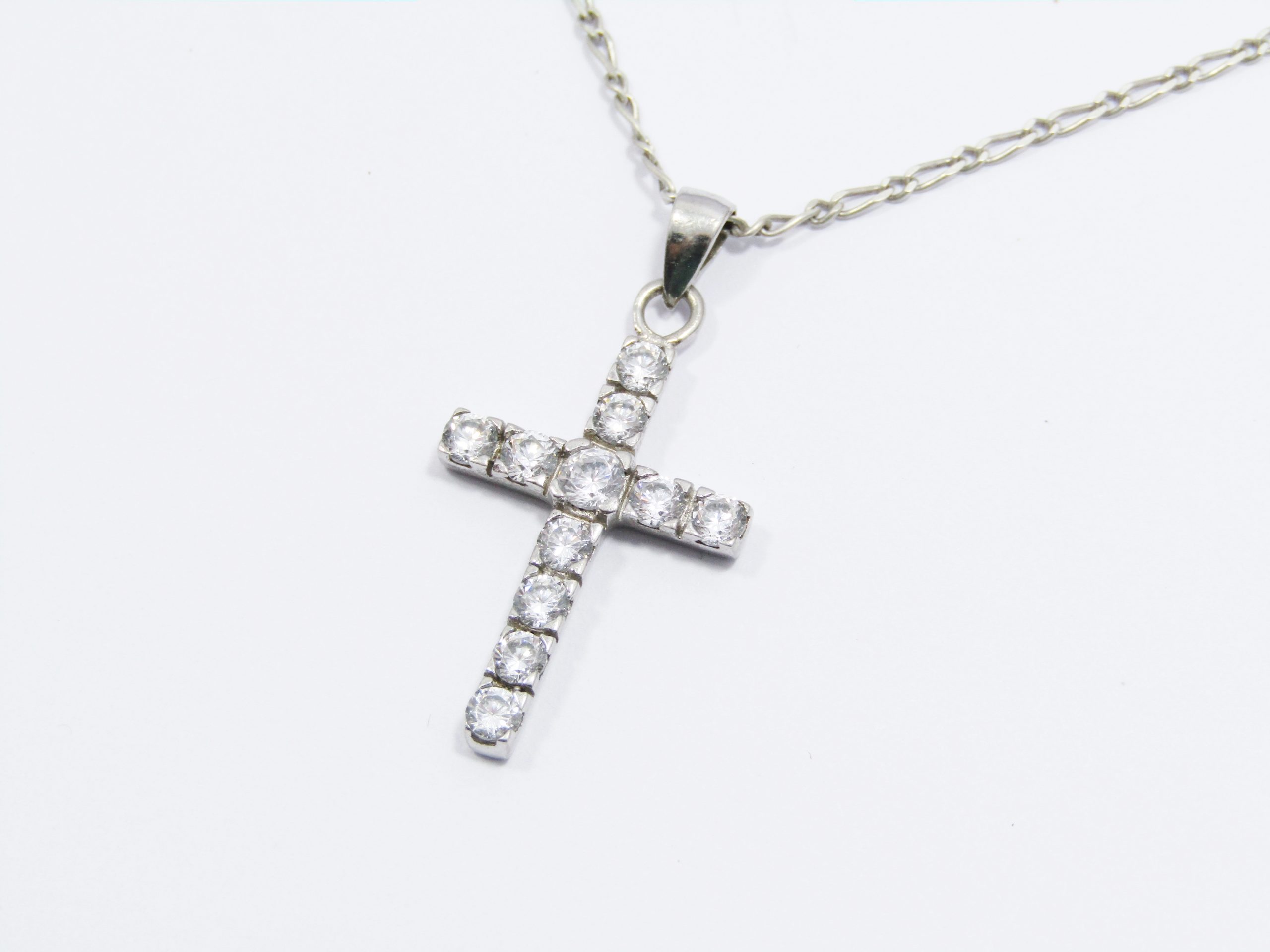 A Stunning Zirconia Cross Pendant on Chain in Sterling Silver.