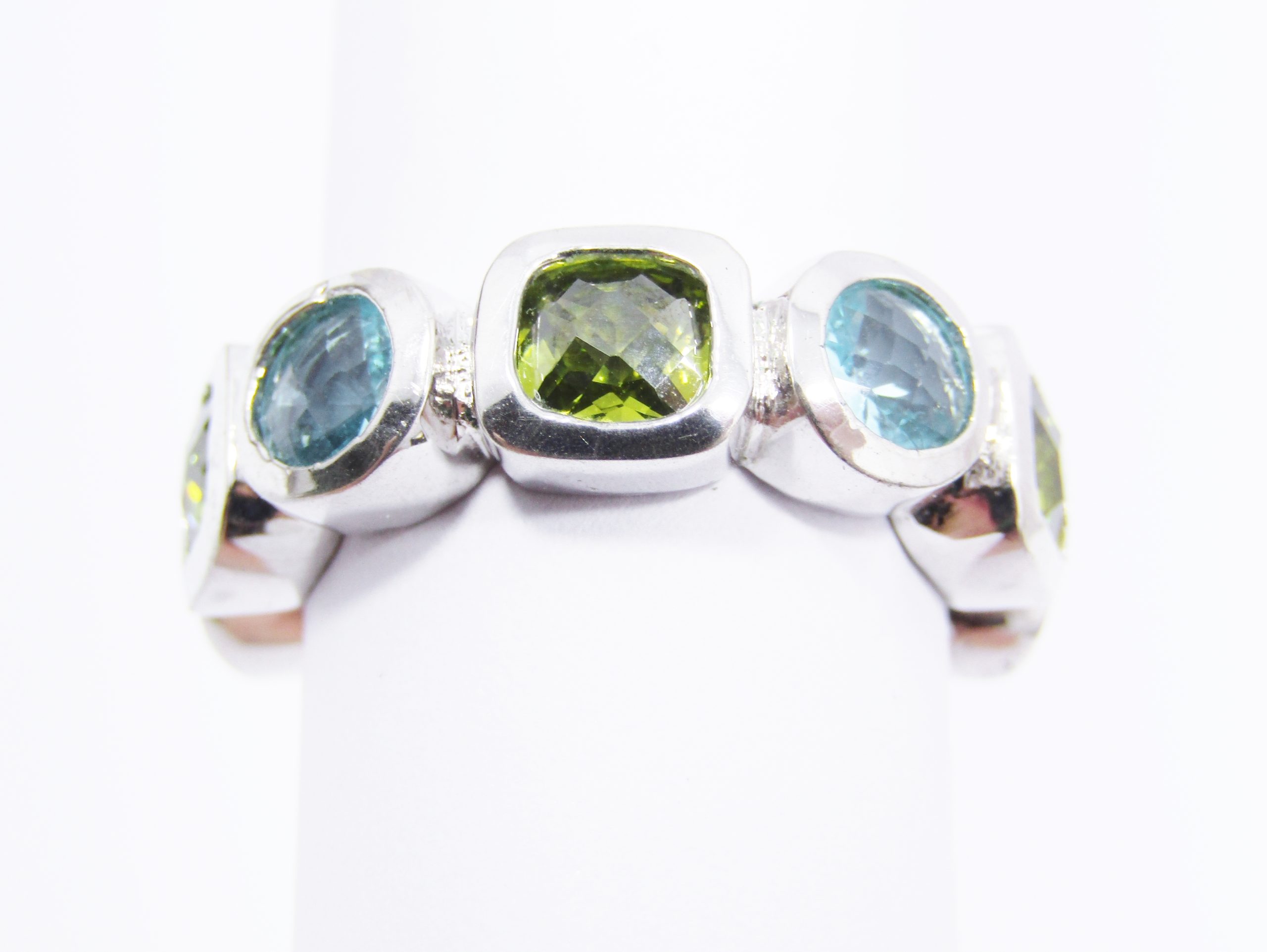 A Lovely Blue and Green  Color Zirconia Full Eternity Ring in a Silver Tone