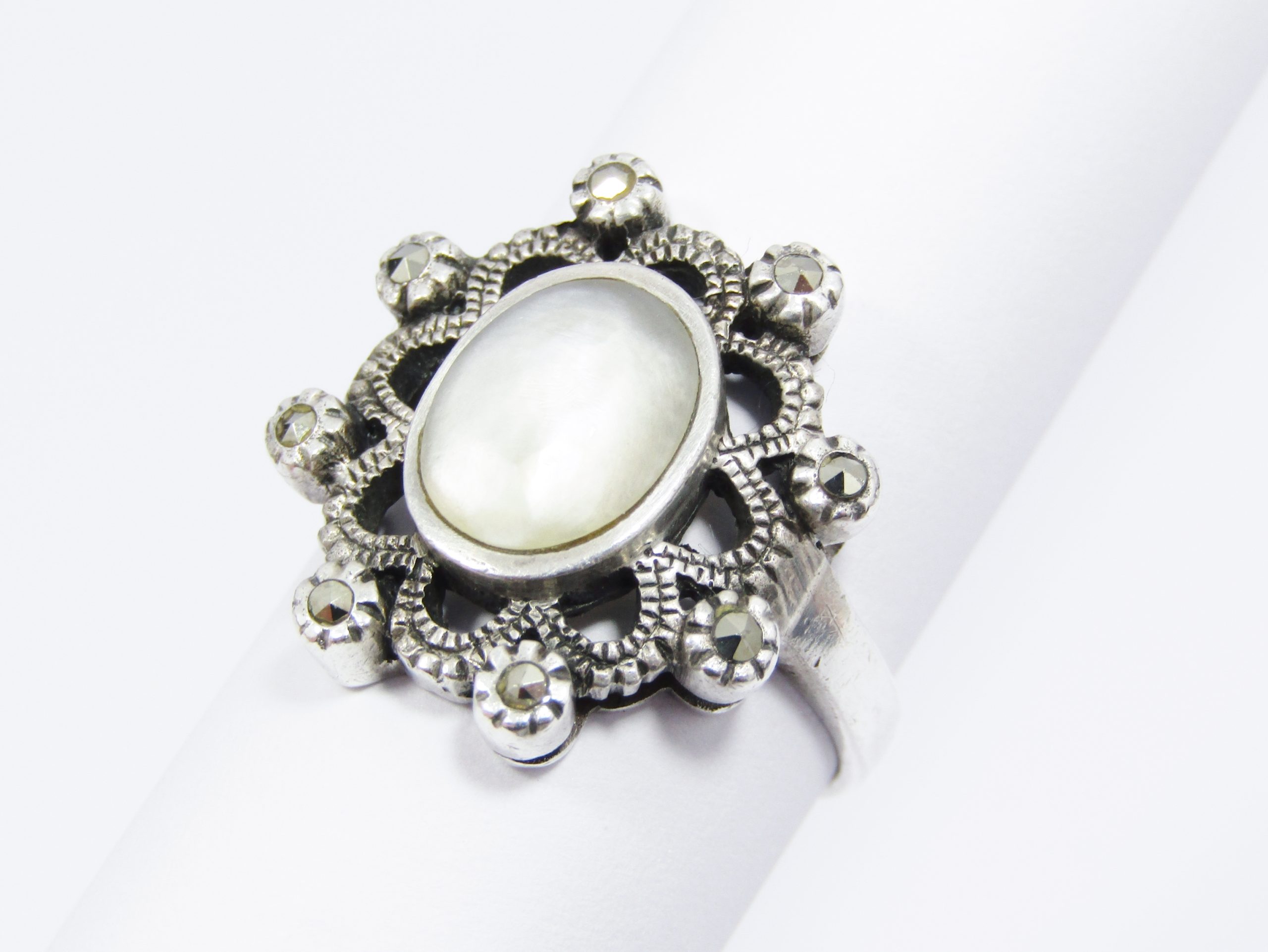 A Lovely Chunky Vintage Design Mother of Pearl ring set with Marcasite's in Sterling Silver