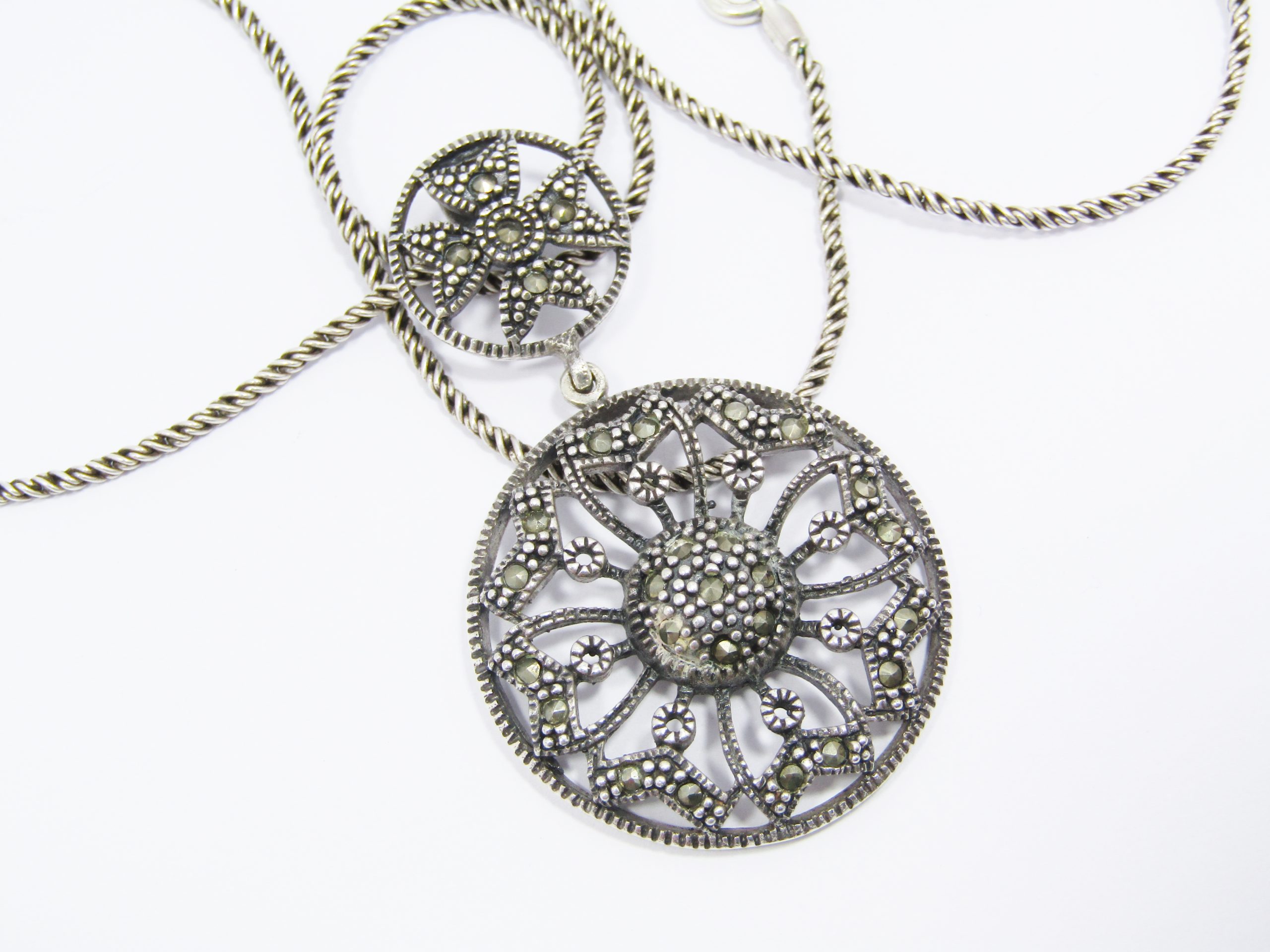 A Beautiful Round Marcasite Pendant on a Rope Design Chain in Sterling Silver