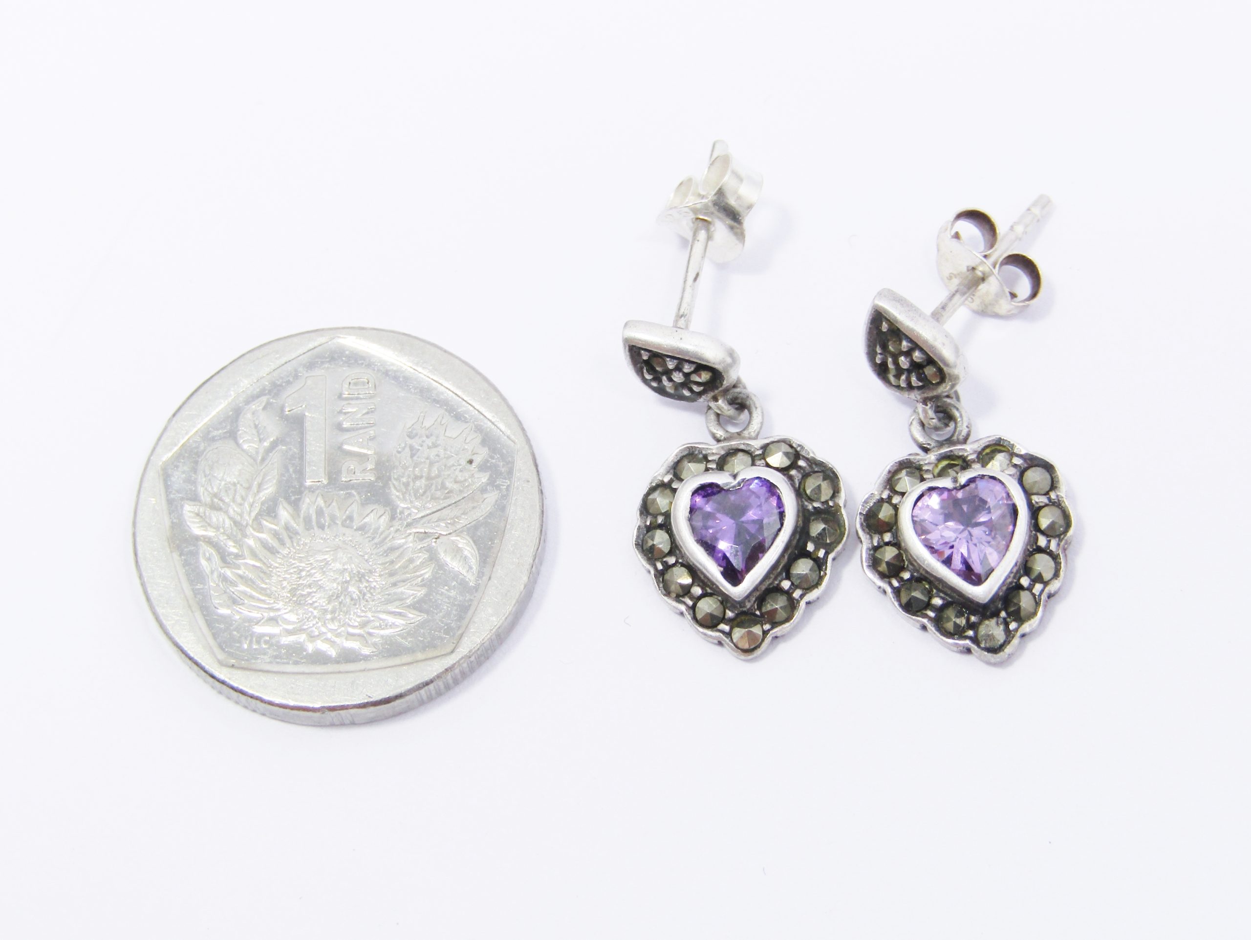 A Gorgeous Pair of purple  Heart Dangling Earring in Sterling Silver