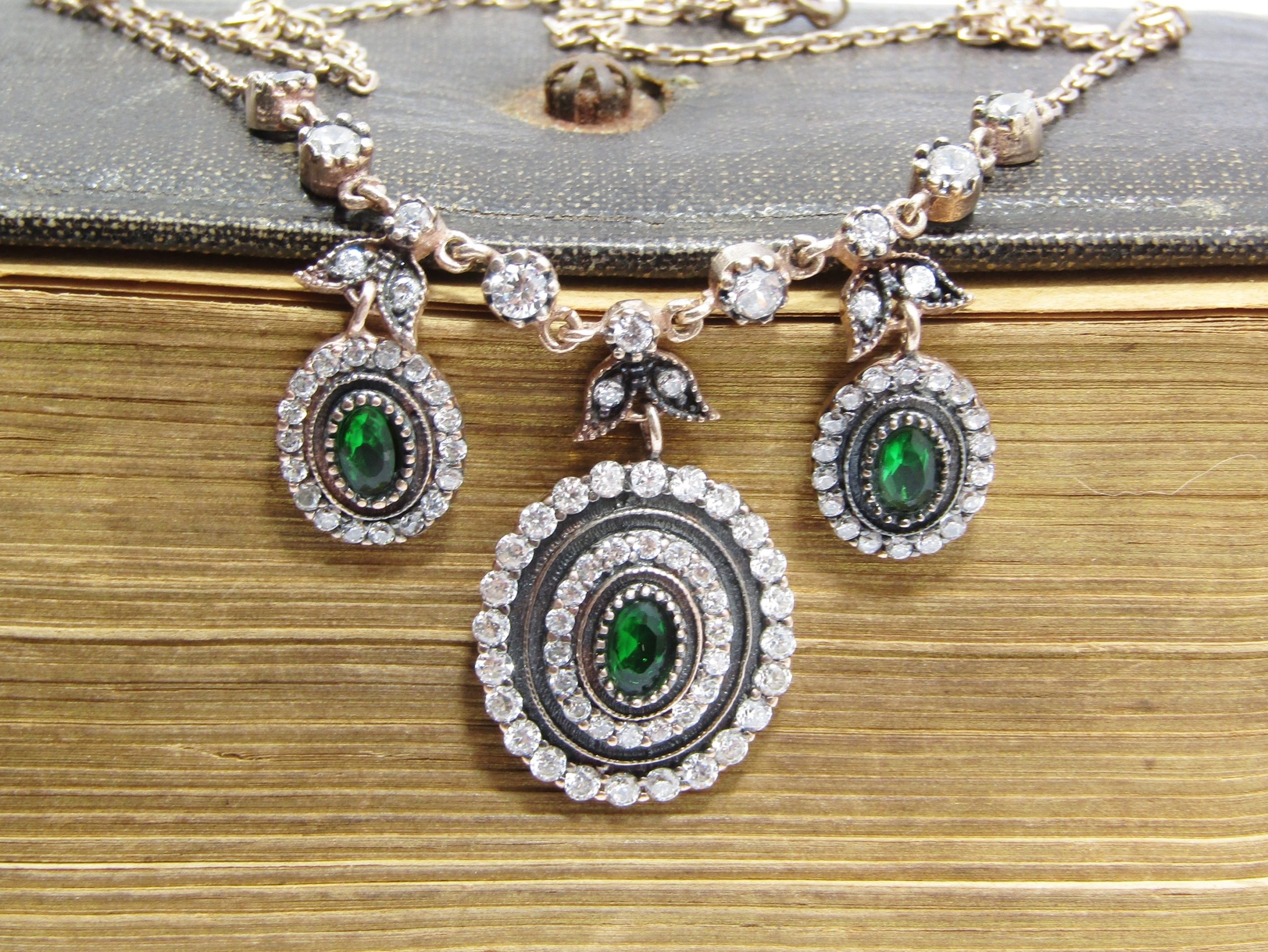 A Gorgeous Eastern Design Necklace with Clear and Green Zirconia Necklace in Sterling Silver.