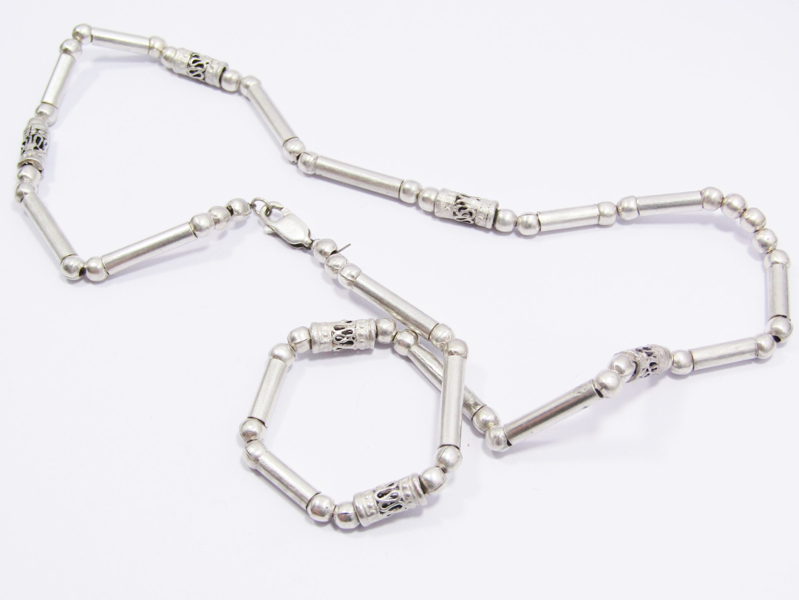 A Lovely Textured Paneled ball Necklace in Sterling Silver.