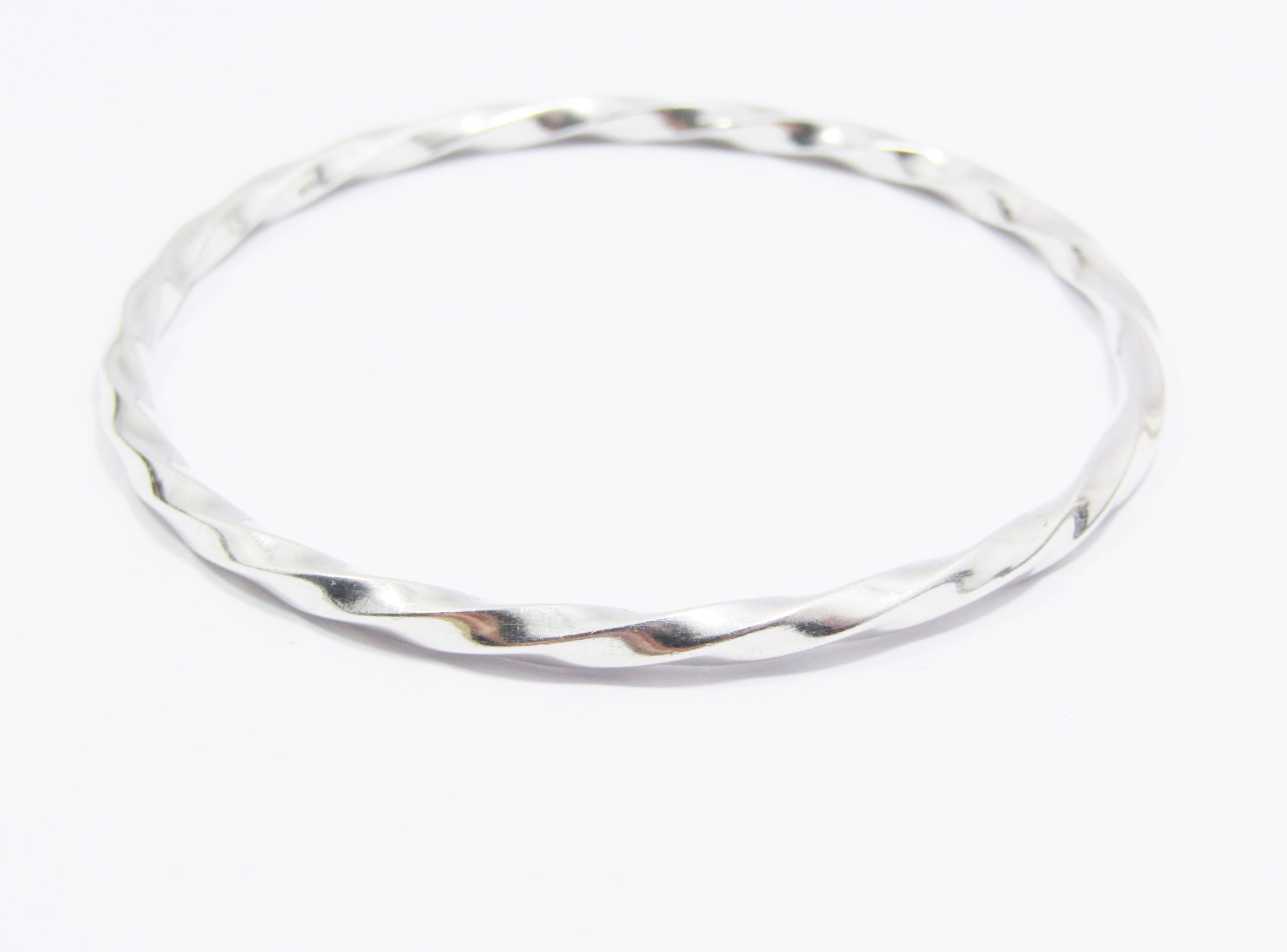 A Lovely Solid Twisted Bangle in Sterling Silver