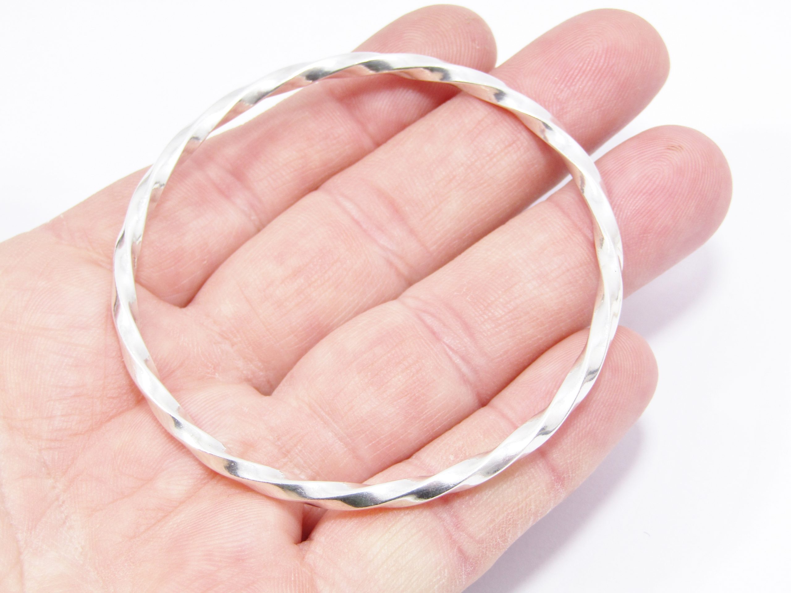 A Lovely Solid Twisted Bangle in Sterling Silver